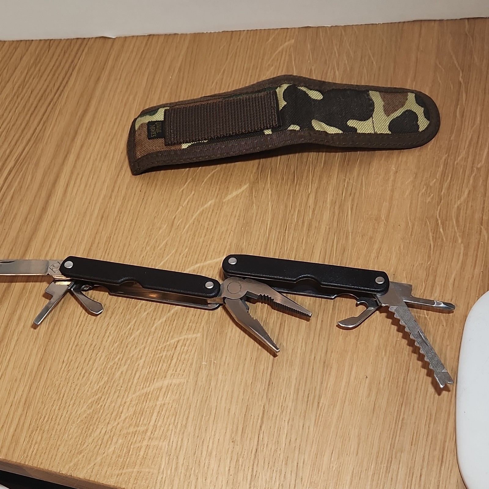 Mountain Quest 9-in-1 Folding Multi-Tool, Stainless 2in Blade, Camo Sheath