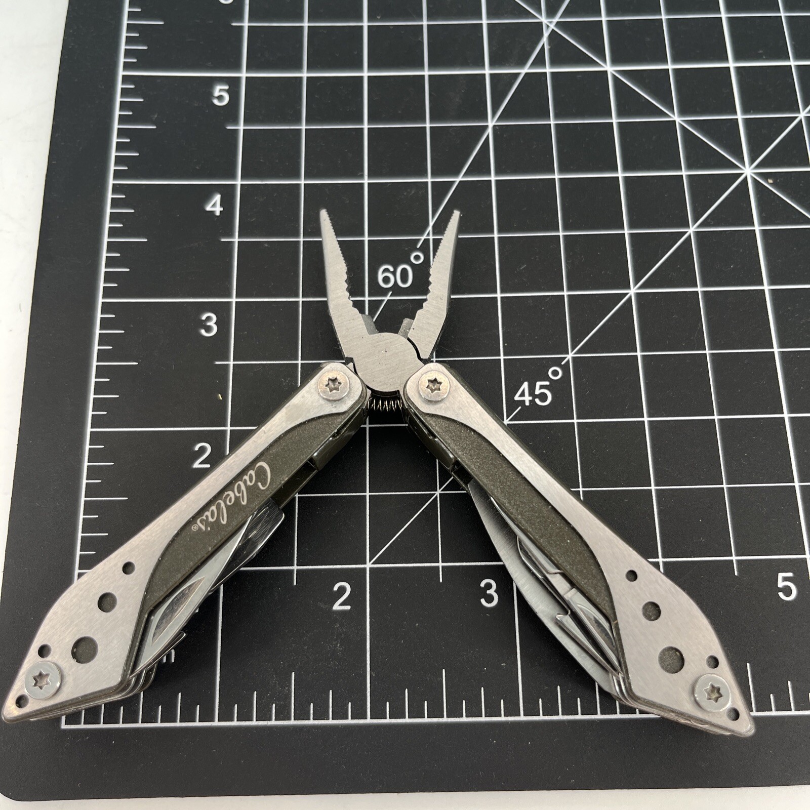 LOT OF 2 Cabela’s SILVER & ORANGE Mini MultiTool Spring Open Pliers Scissors Saw