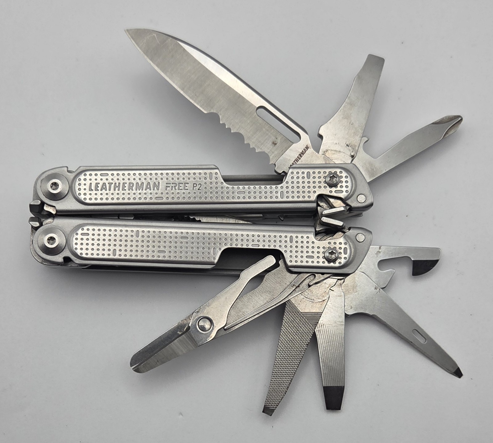 Retired Leatherman Free P2 Stainless Steel Multi-Tool Silver Great Condition