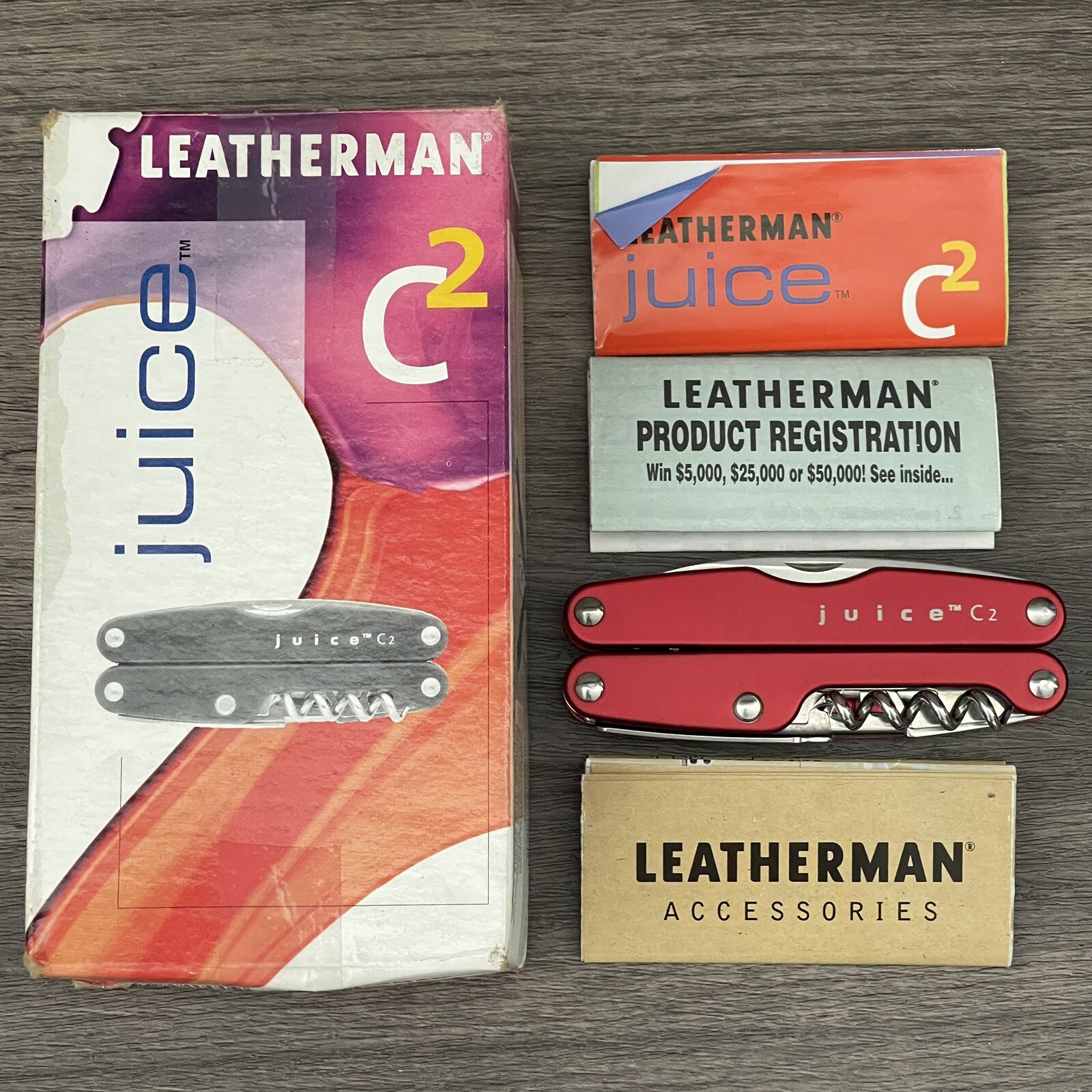 TWO Leatherman Juice C2 Red multitools. TM variants. Discontinued