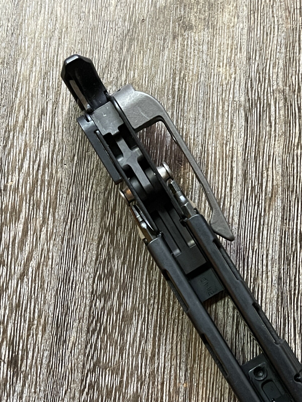 Leatherman MUT Black w/Titanium Clip multi tool, brown sheath. Made 01/2012