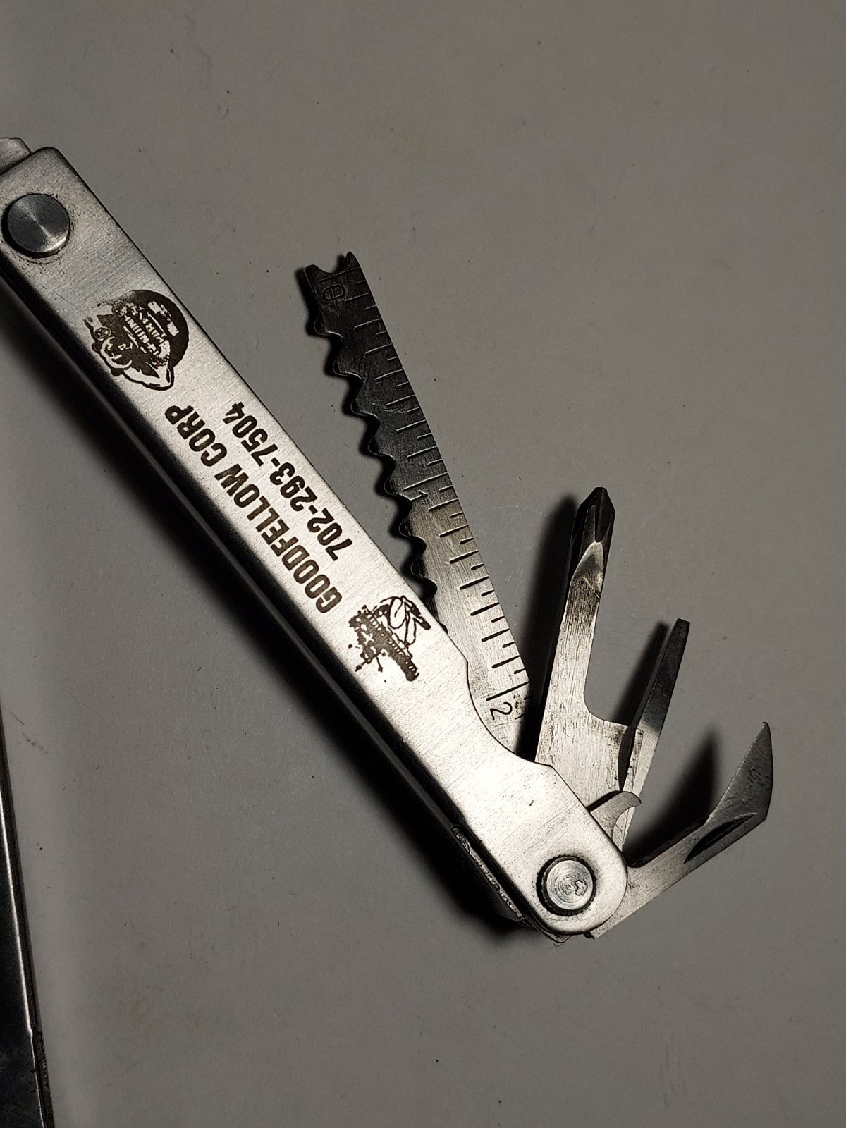 Multi Tool + Nylon Pouch advertising Goodfellow Corp – Pliers, Blade