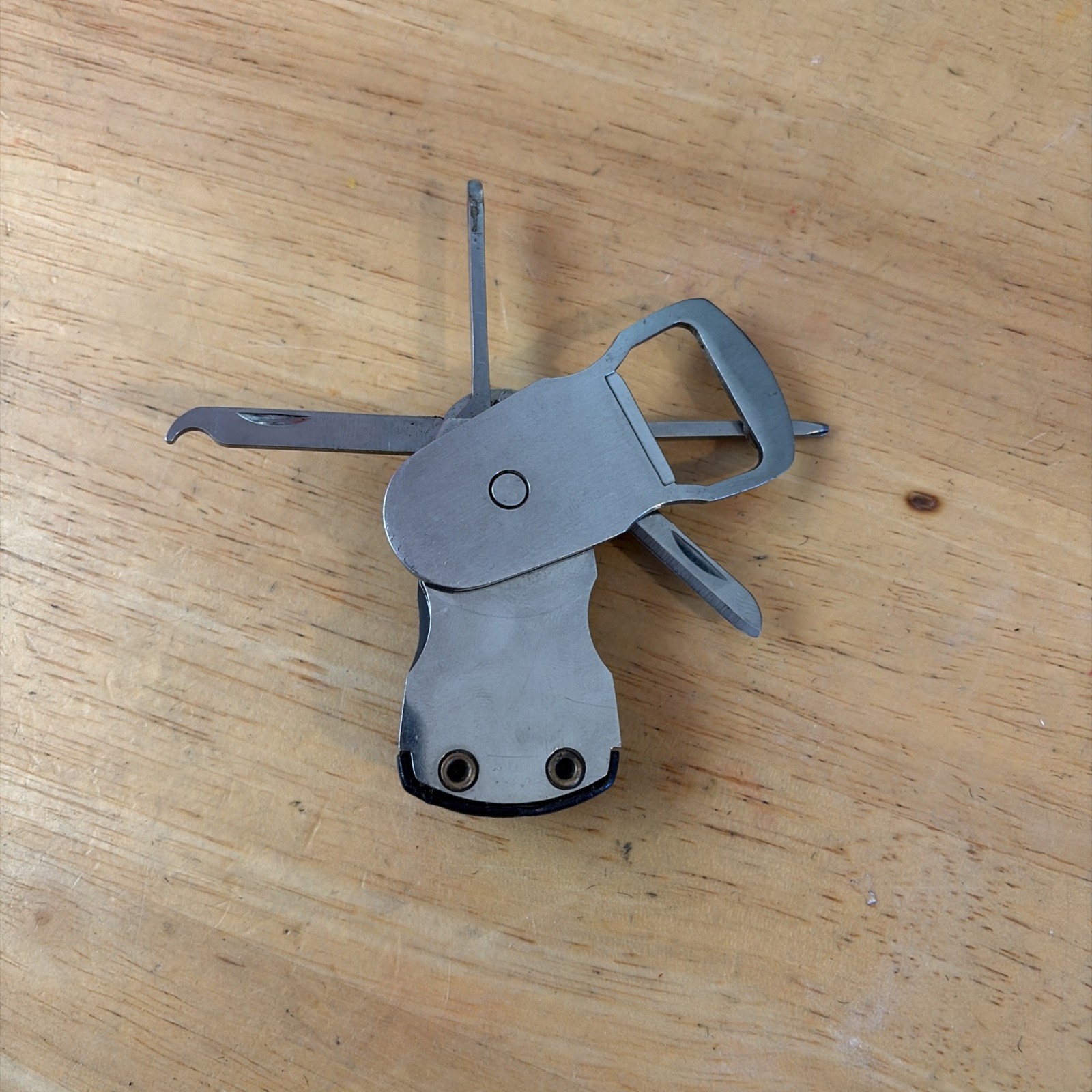 Swiss+Tech Swivel Tool 8-in-1 bottle opener multi tool with light