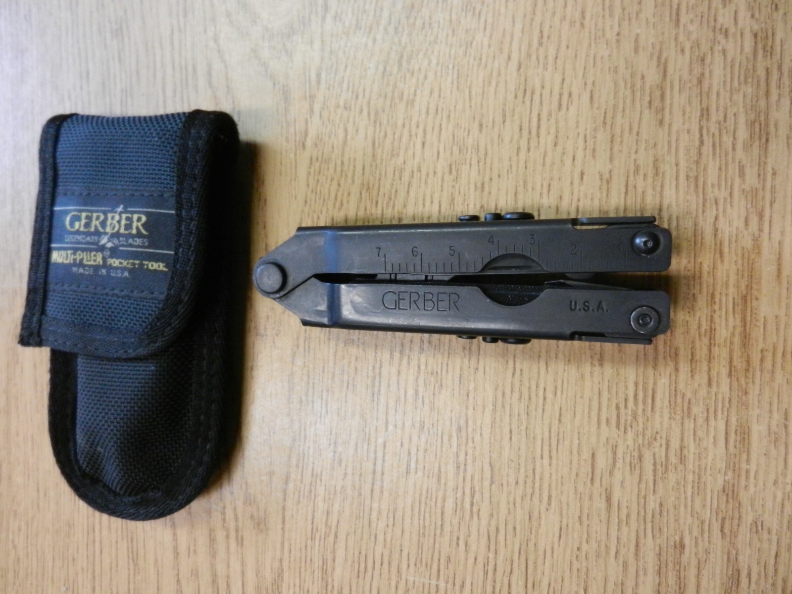 Gerber Black Multi Tool US Patent 5142721 & 5212844 W / Sheath 4 1/2″ Long