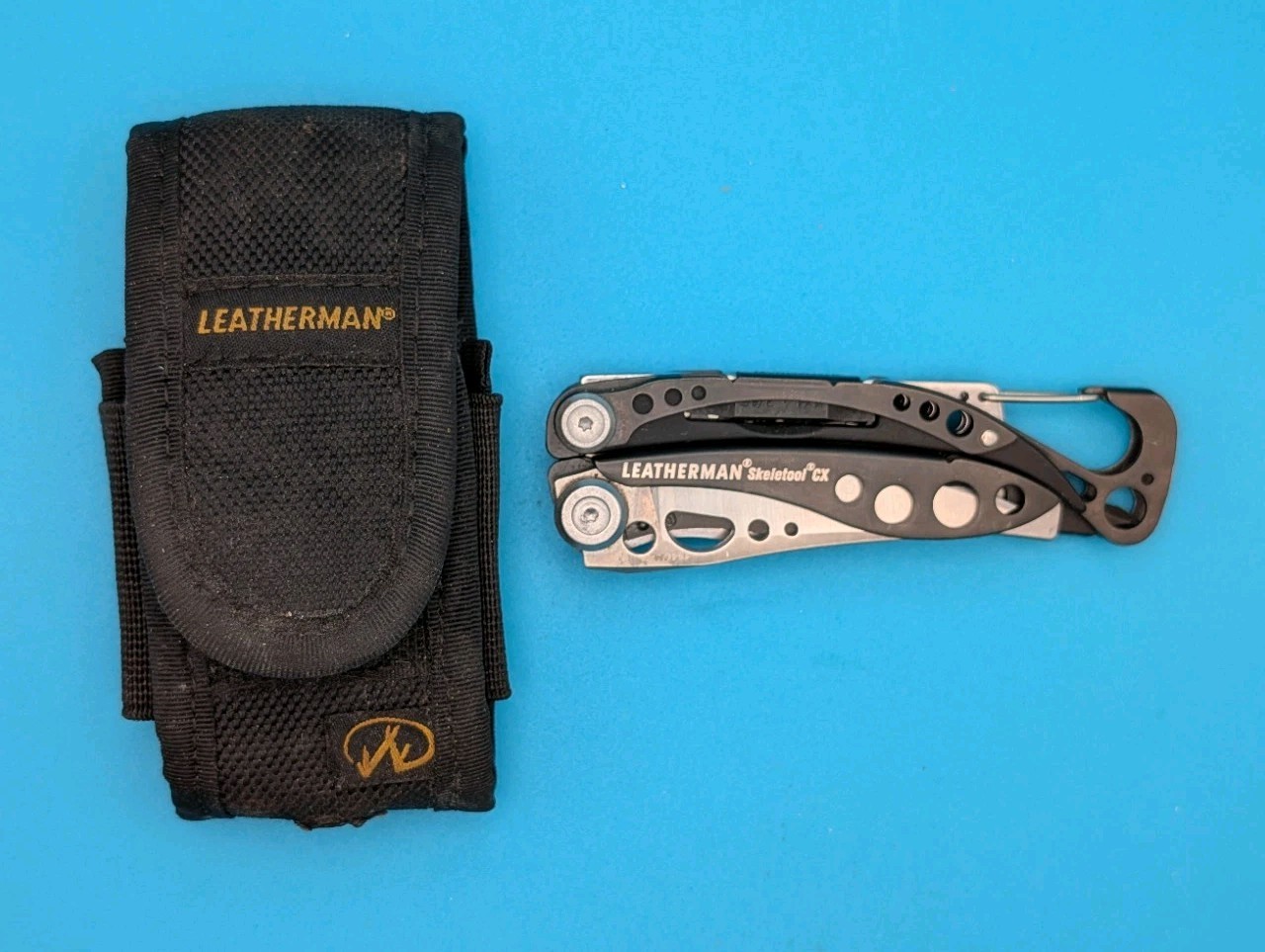 Leatherman Skeletool CX Multitool Plain Edge Knife! WITH SHEATH!