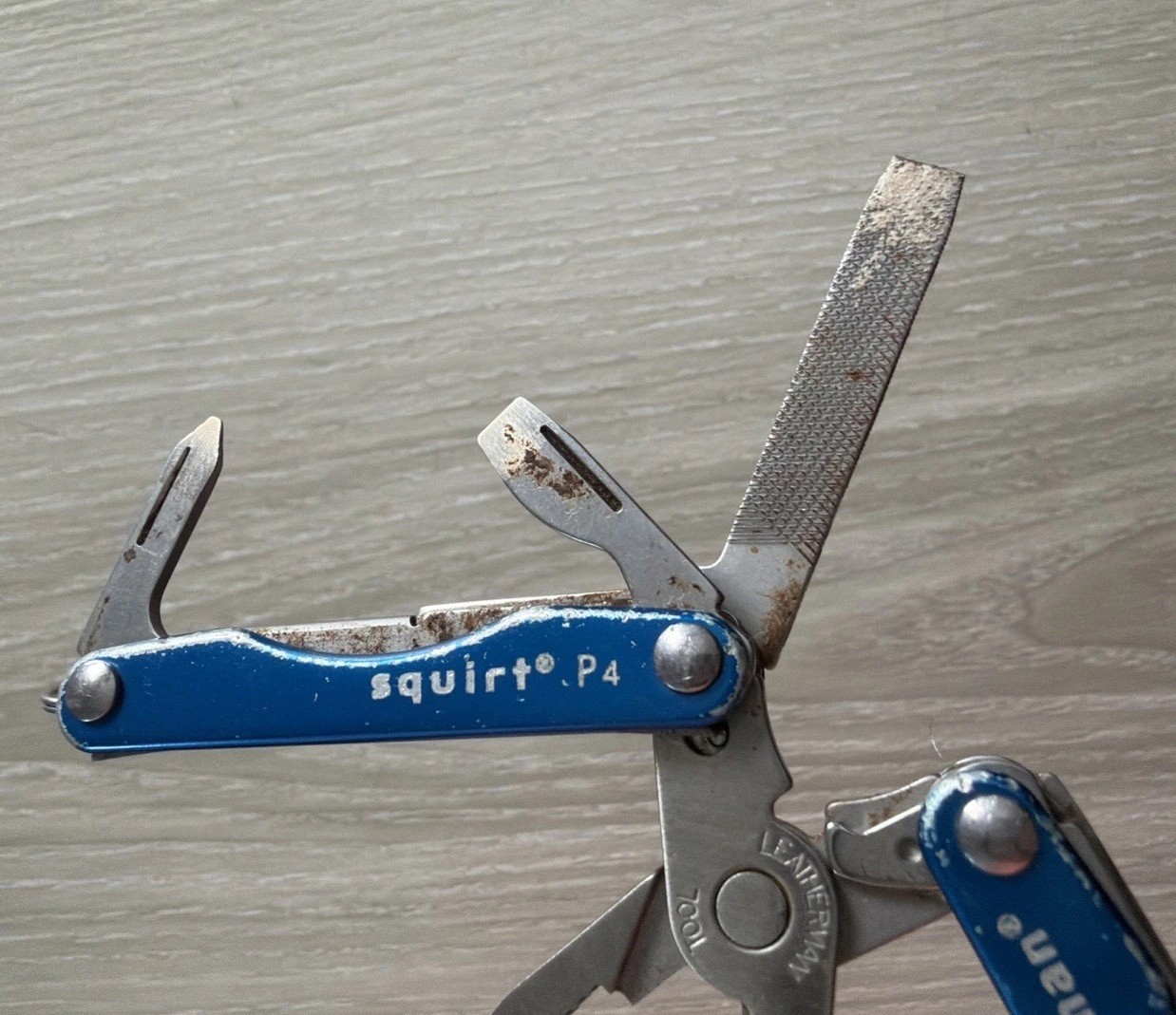 Leatherman Squirt P4 MultiTool Plier Knife File Drivers Blue Metallic