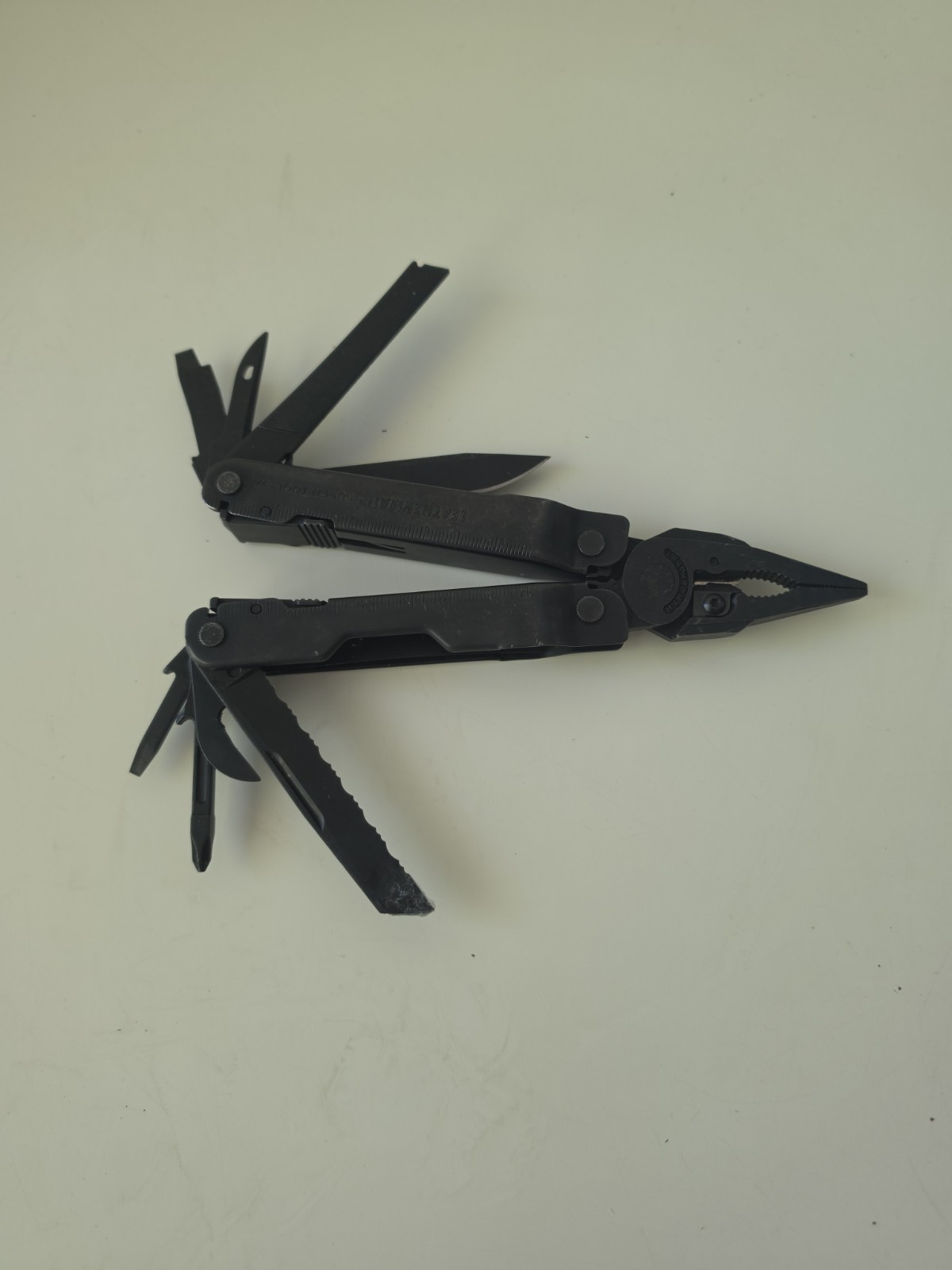 Leatherman Super Tool 300 Multi-tool Pliers! BLACK OXIDE!
