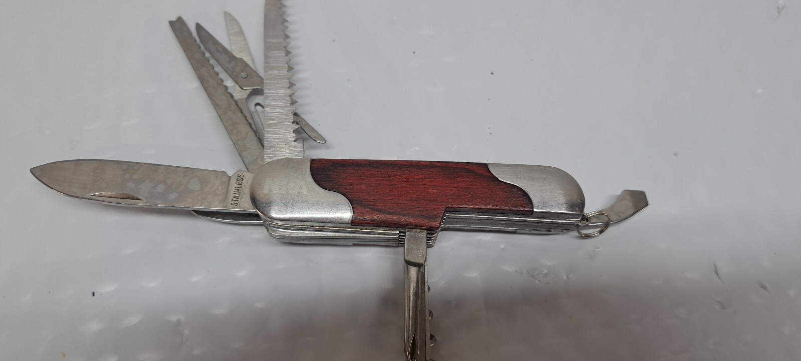 NRA LOGO SS MULTI TOOL WITH 12 TOOLS AND LANYARD LOOP 10/4/1