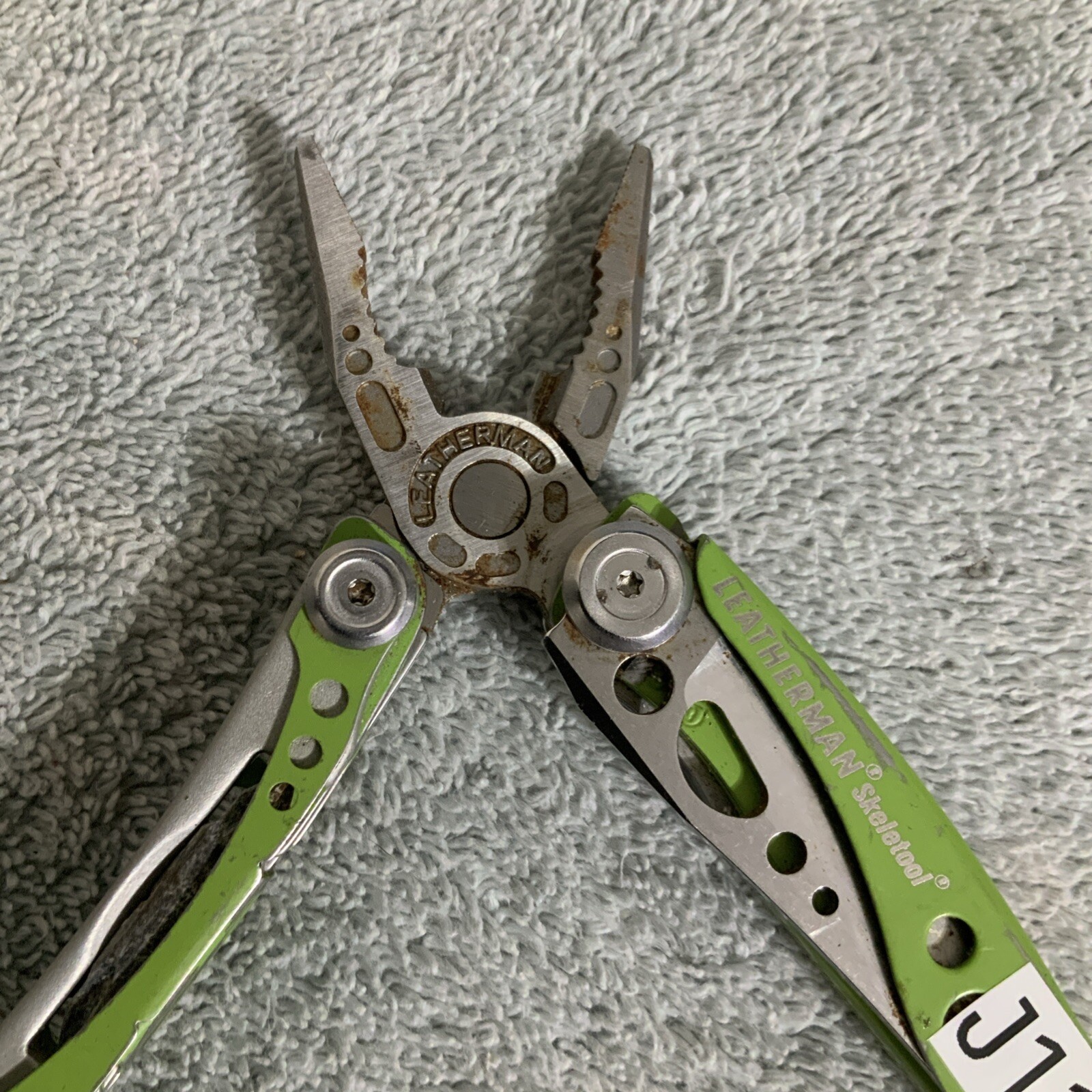 Retired Leatherman “Skeletool Lime Green” Stainless Steel Multi Tool Rust – J11