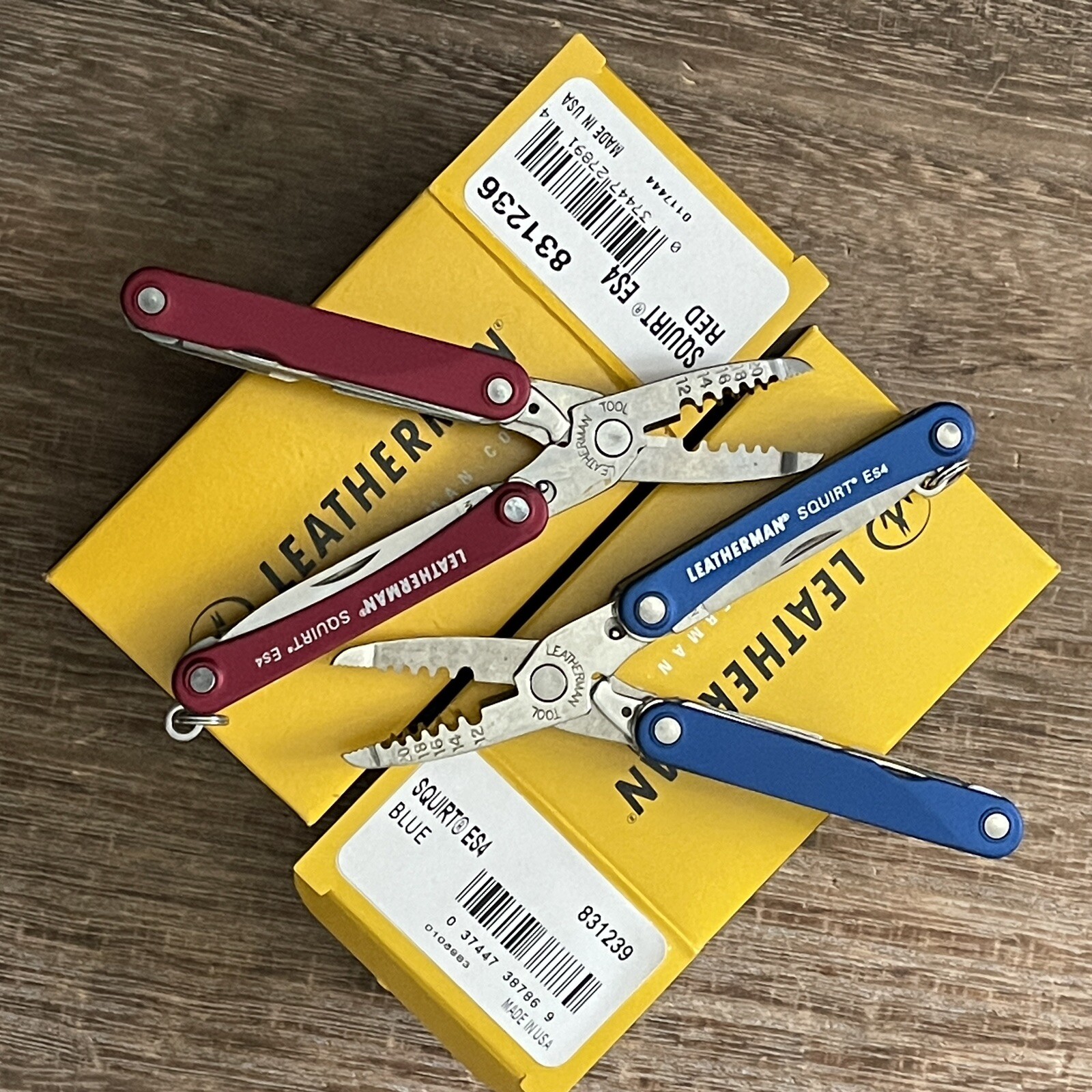 Set of two: Leatherman Squirt ES4 Blue & Squirt ES4 Red multitools. New