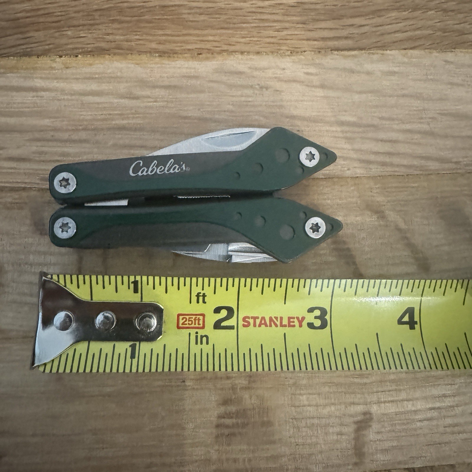 Cabela’s 7 Tool Multi-Tool with Sheath Spring Open Pliers Scissors Saw Green