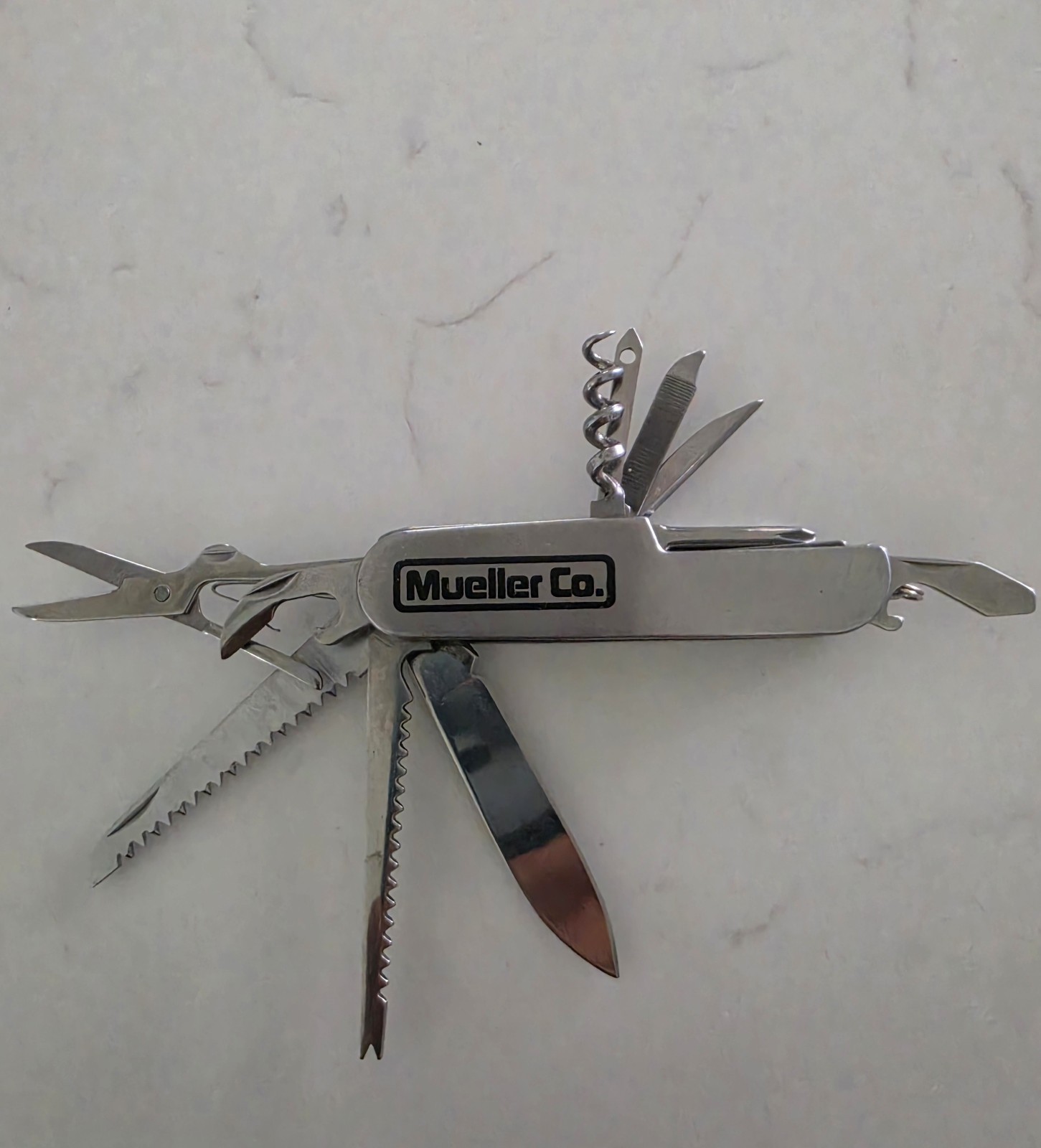 Mueller Co. Stainless Steel 12-in-1 Multi-Tool Knife Saw Scissors 2″ Blade