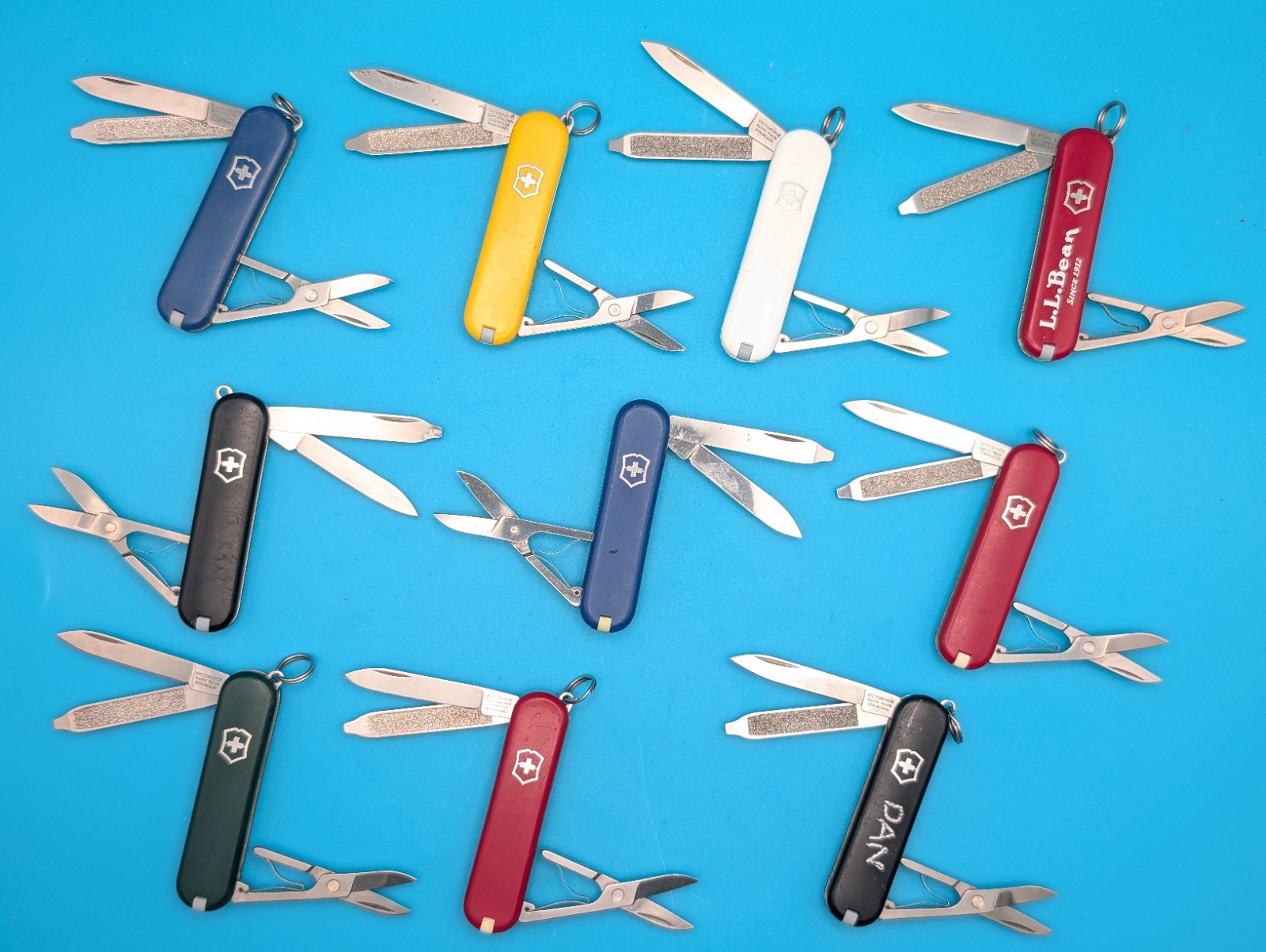 Lot of 10 Victorinox Classic Swiss Army Knife Multi Tools!