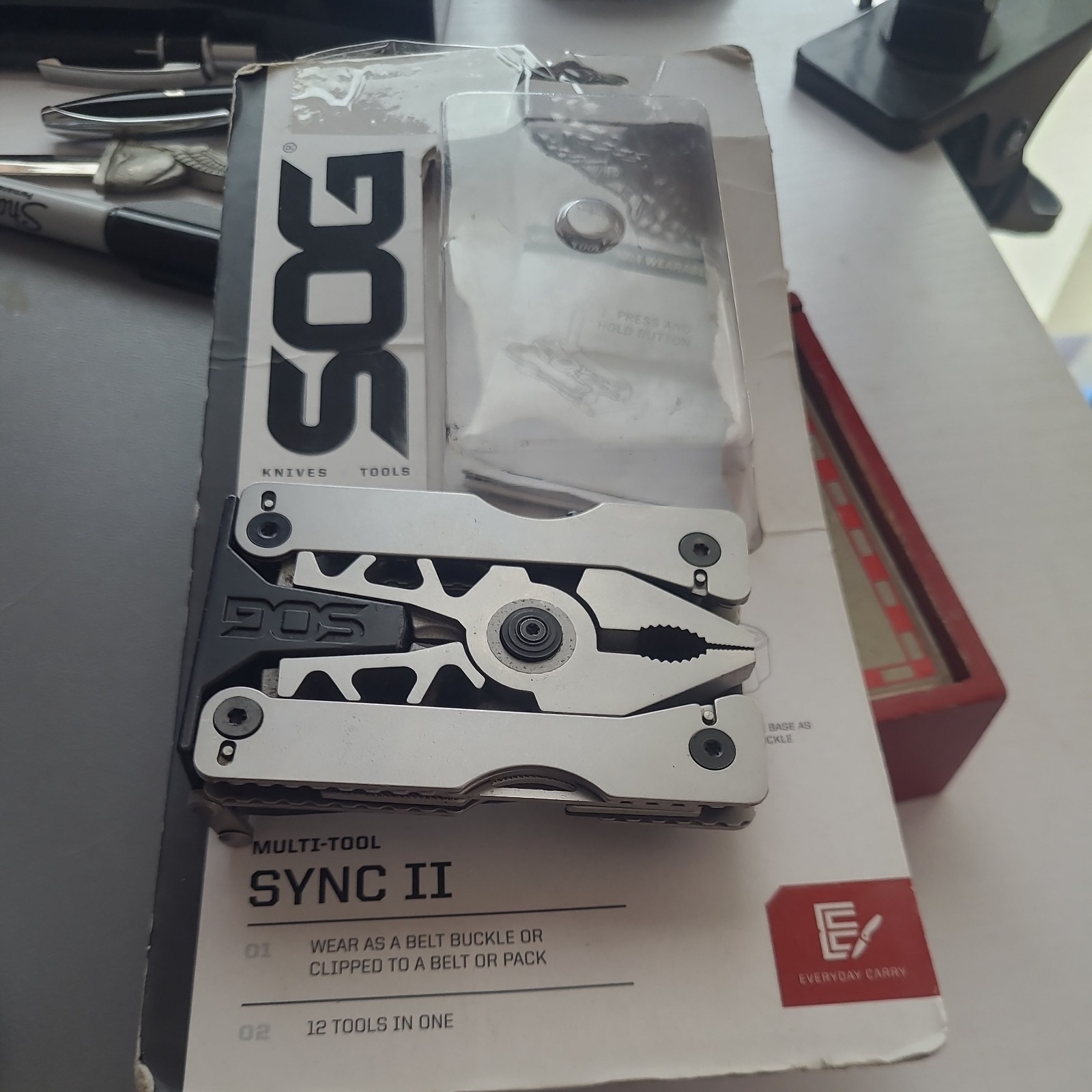 SOG SYNC II MULTI TOOL belt buckle survival tool