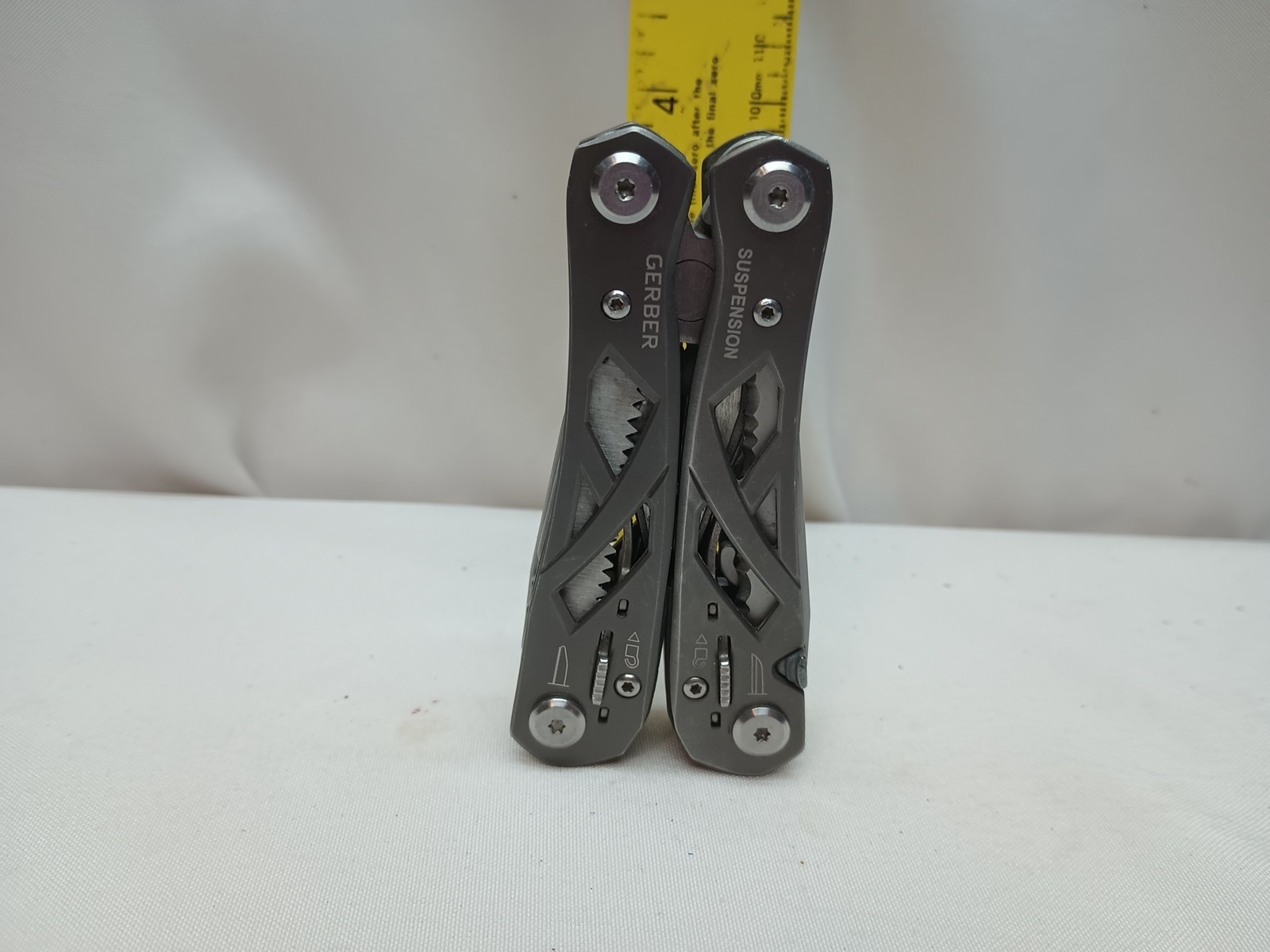 One Gerber Suspension 897011BE 8 Tools Plus Pliers