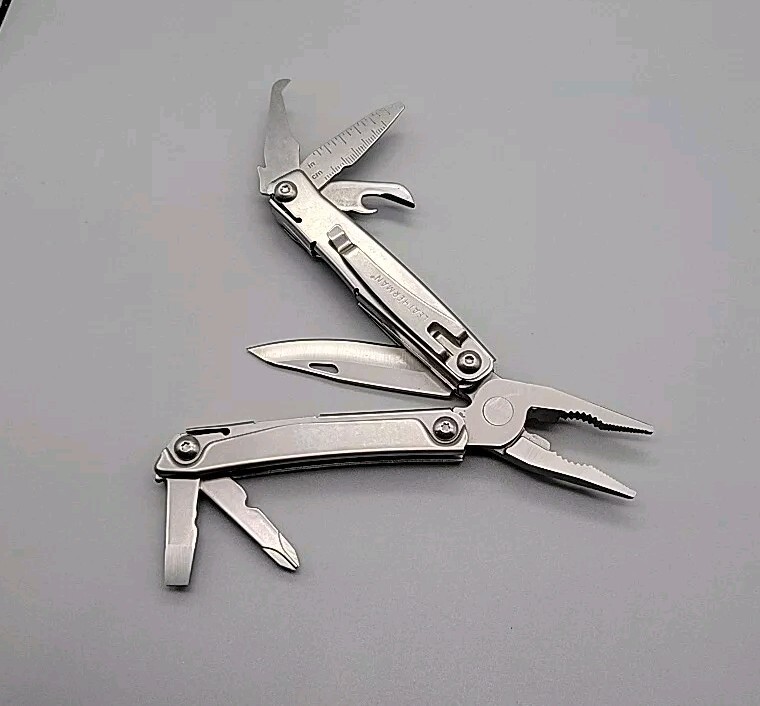 Leatherman Rev Multi-Tool – Pliers, Knife, Screwdrivers, Can Opener, File