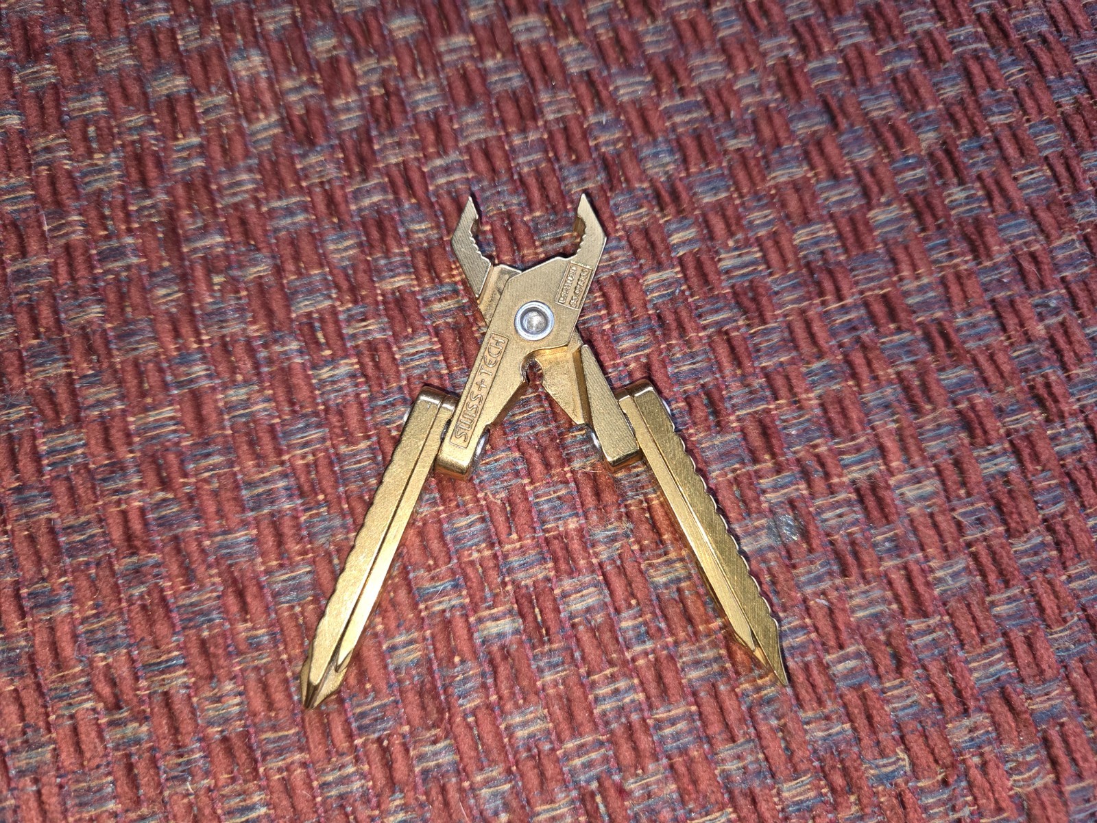 Swiss+Tech gold US patent #5491856 compact multi-tool