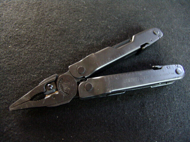 LEATHERMAN SUPERTOOL 300- BLACK OXIDE-MULTI TOOL-w/LEATHERMAN MOLLE CASE-NR MINT