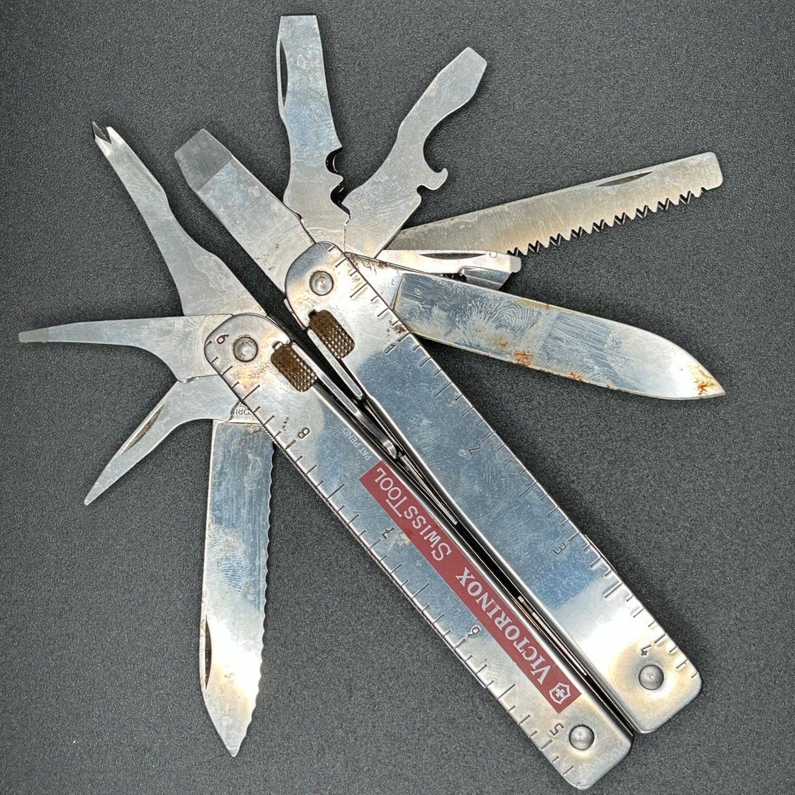 VTG Victorinox SwissTool Multi-Tool Stainless Steel W/Black Pouch Swiss Made