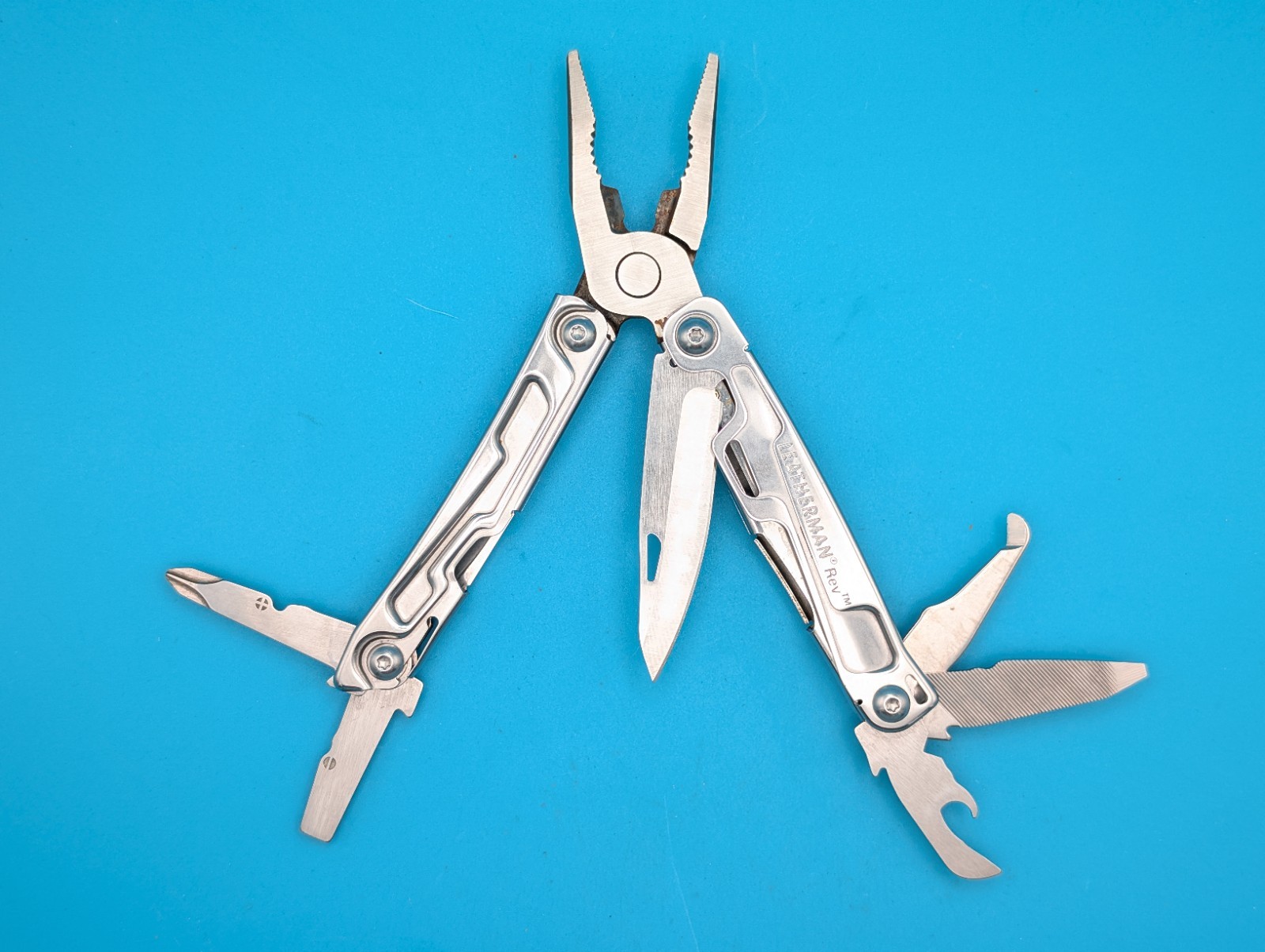 Leatherman Rev 3.8″ Multi-Tool, Stainless! *SOME RUST ON ITEM*