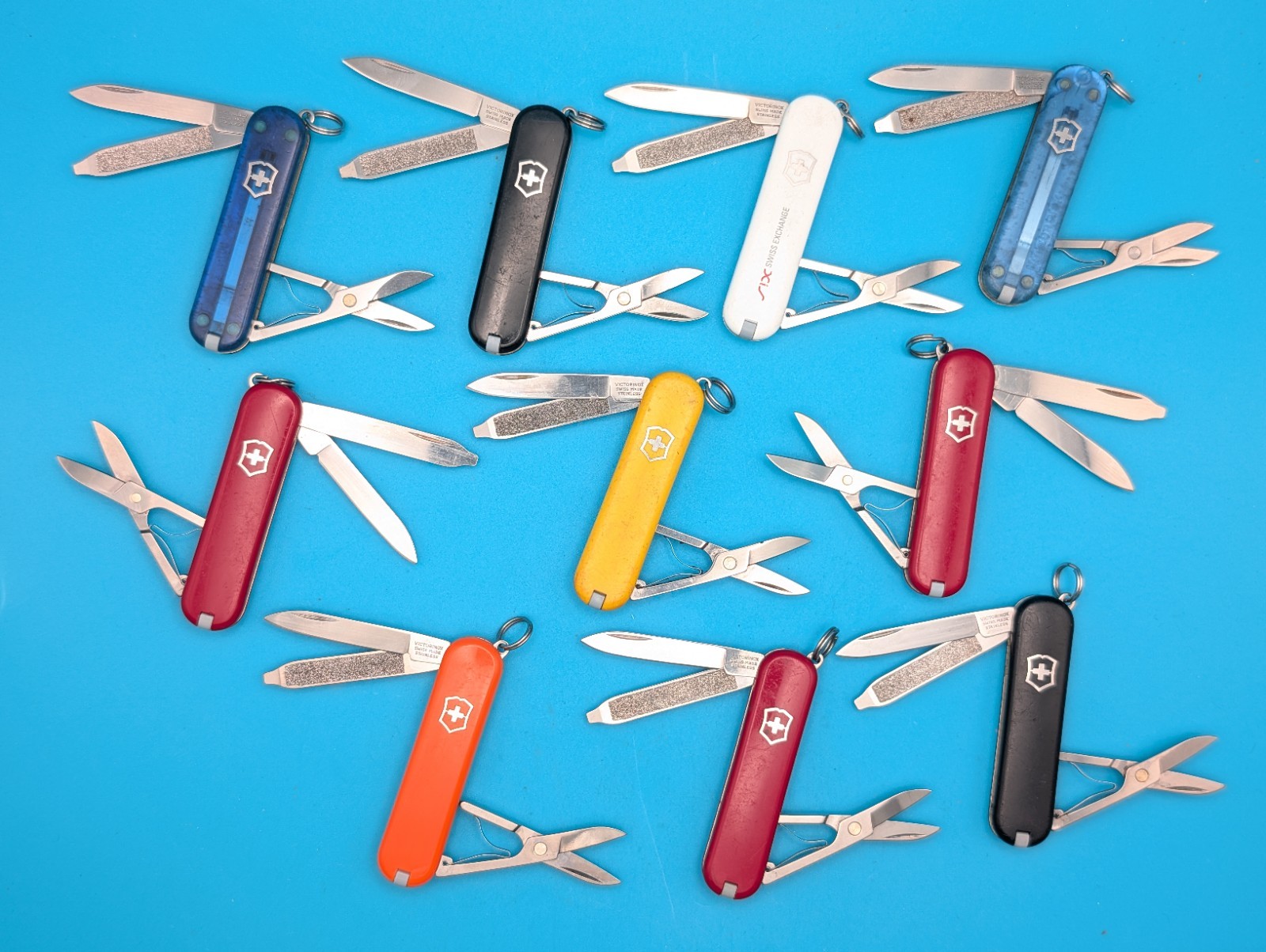 Lot of 10 Victorinox Classic Swiss Army Knife Multi Tools!