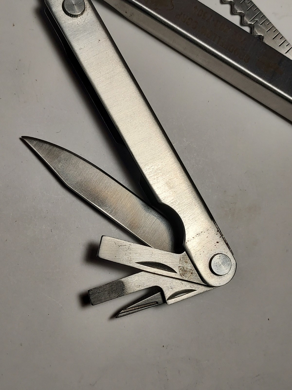 Multi Tool + Nylon Pouch advertising Goodfellow Corp – Pliers, Blade