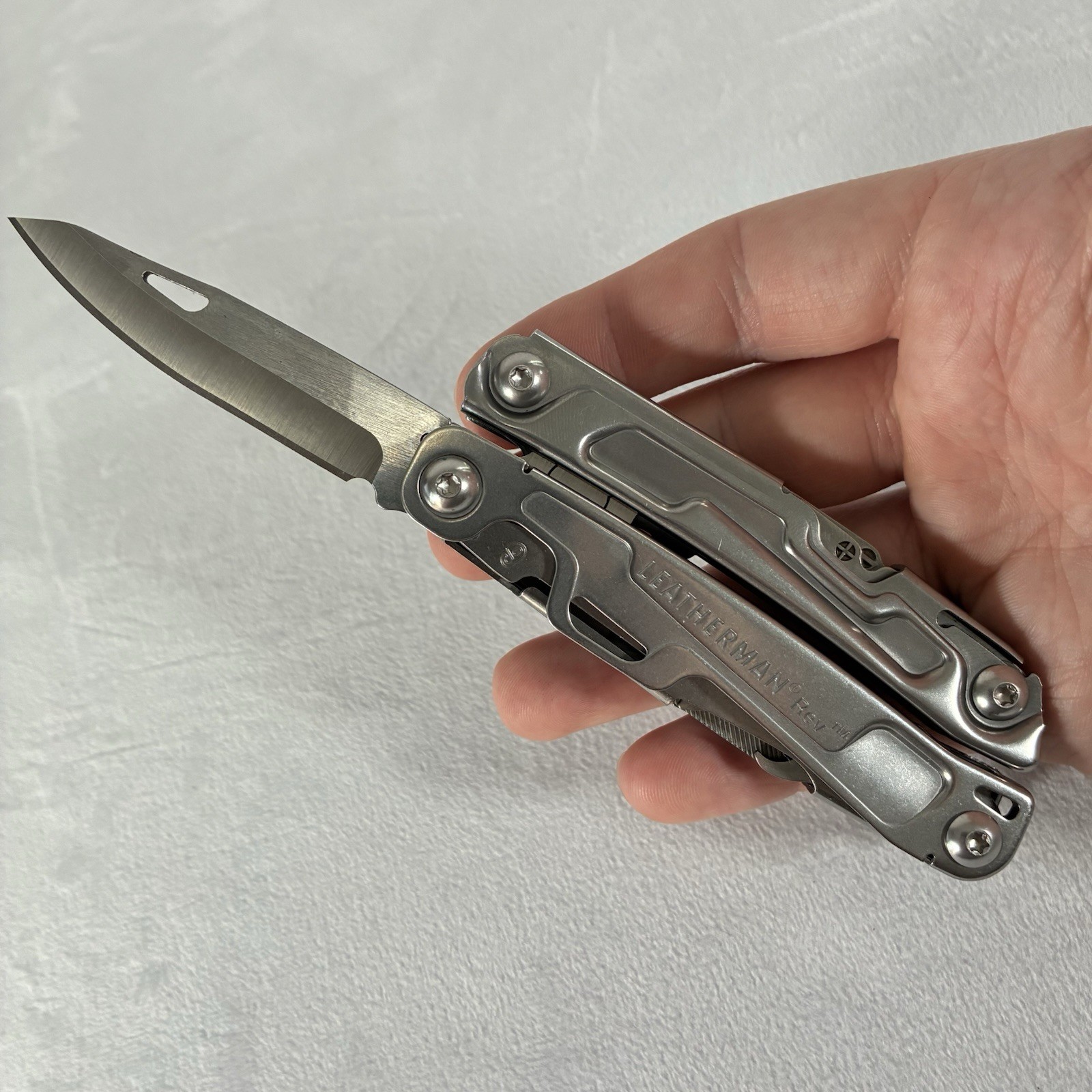 Leatherman Rev Stainless Steel 14-Tool Multi-Tool Pocket Knife w/ Pocket Clip