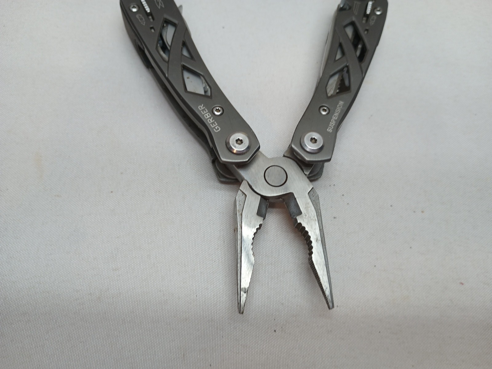 One Gerber Suspension 897011BE 8 Tools Plus Pliers