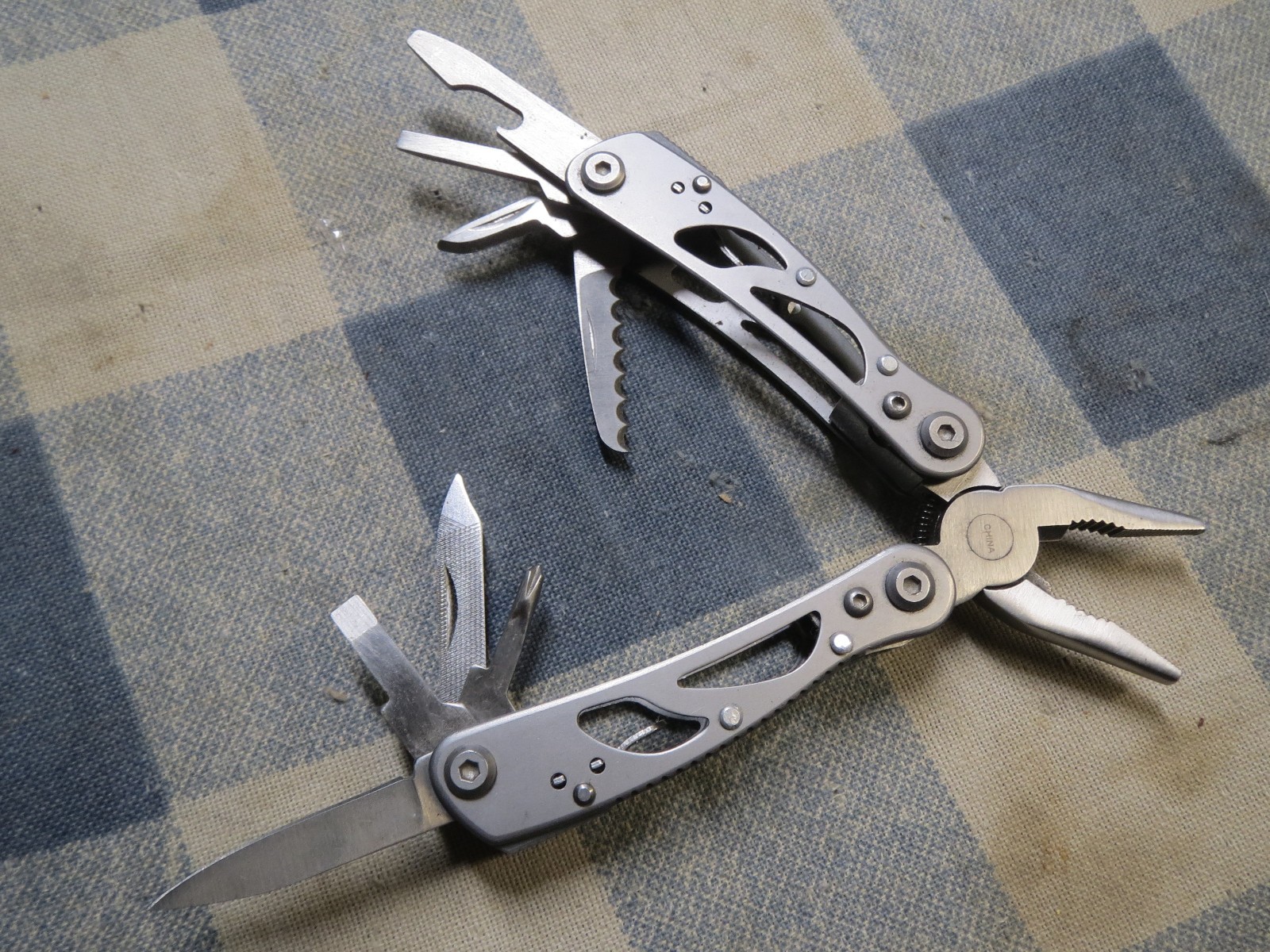 Used Small Stainless Multi-Tool 2 13/16 inch folded length