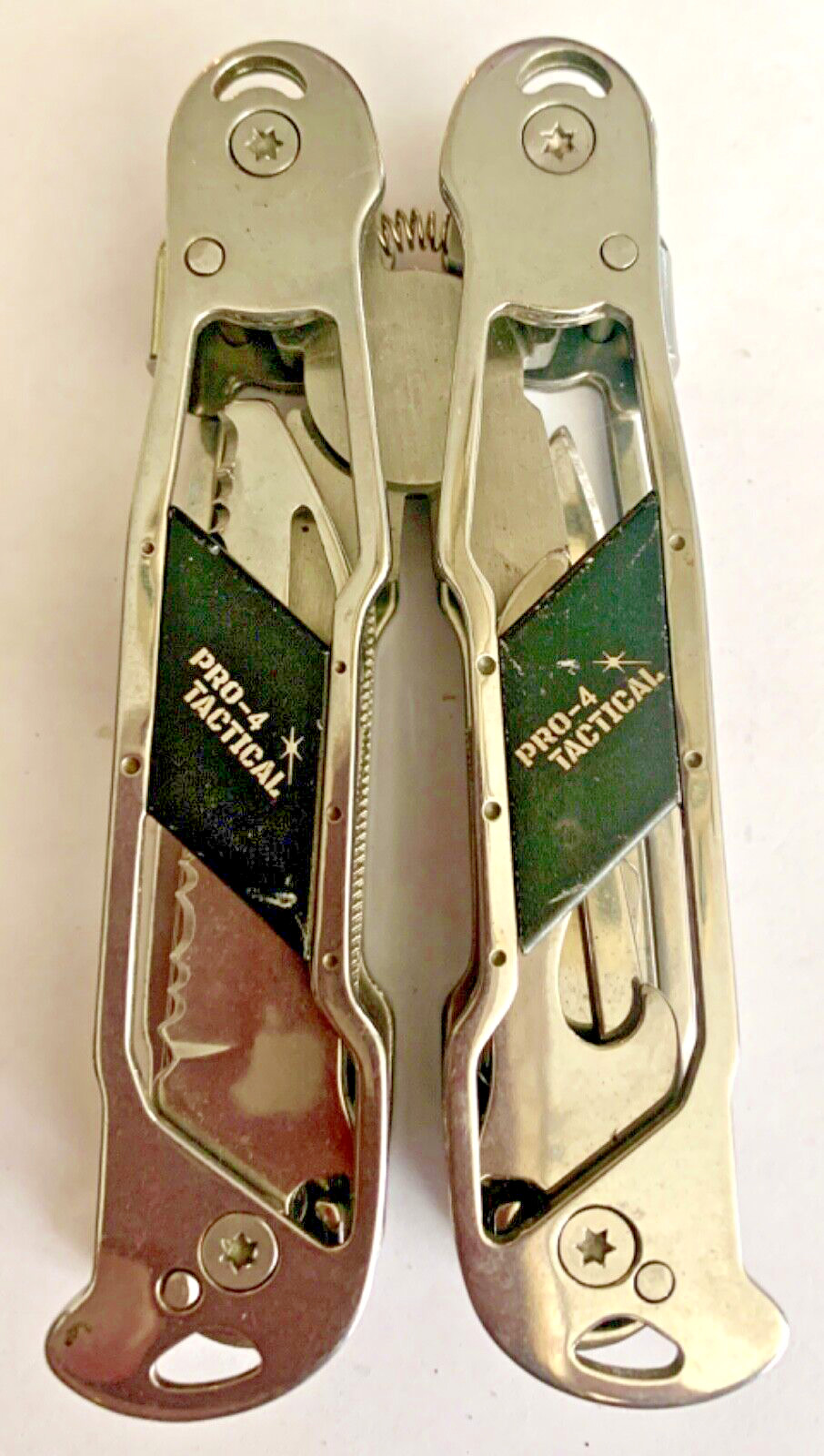 PRO-4 POWER TACTICAL 12-IN-1 MULTI-TOOL PLIERS, CHROME TONE METAL & BLACK