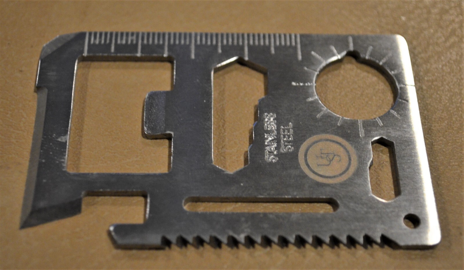 Smallish Wallet Size Multi Survival Tool in Silver Metal Thin Small Hunting Camp