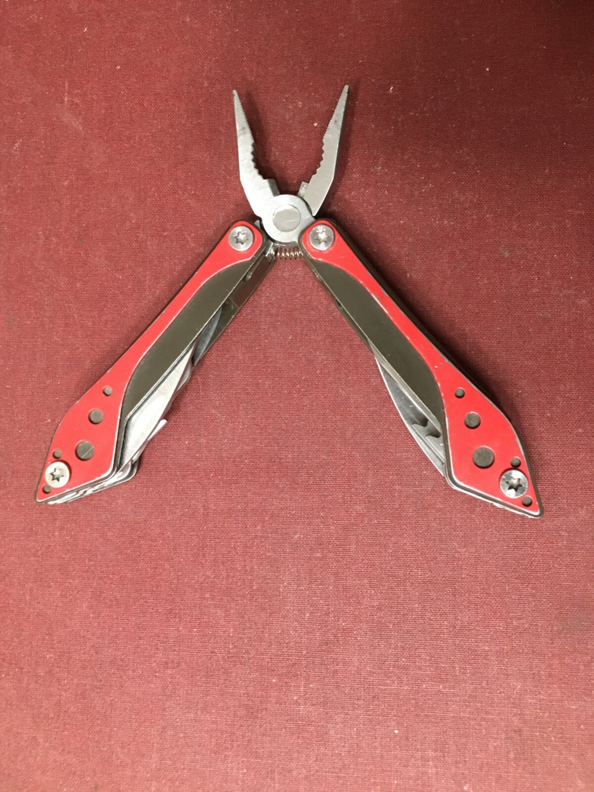 Cabela’s 4-1/2″ Multi-Tool in Red and Black with 7 Tools In One