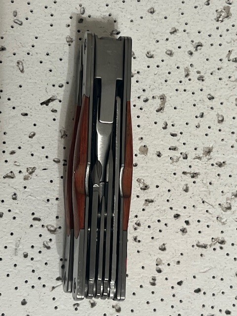 NRA Multi-Tool 4.5” Pliers ,Knives , Can Opener , Ruler and Saw Wood Handle—
