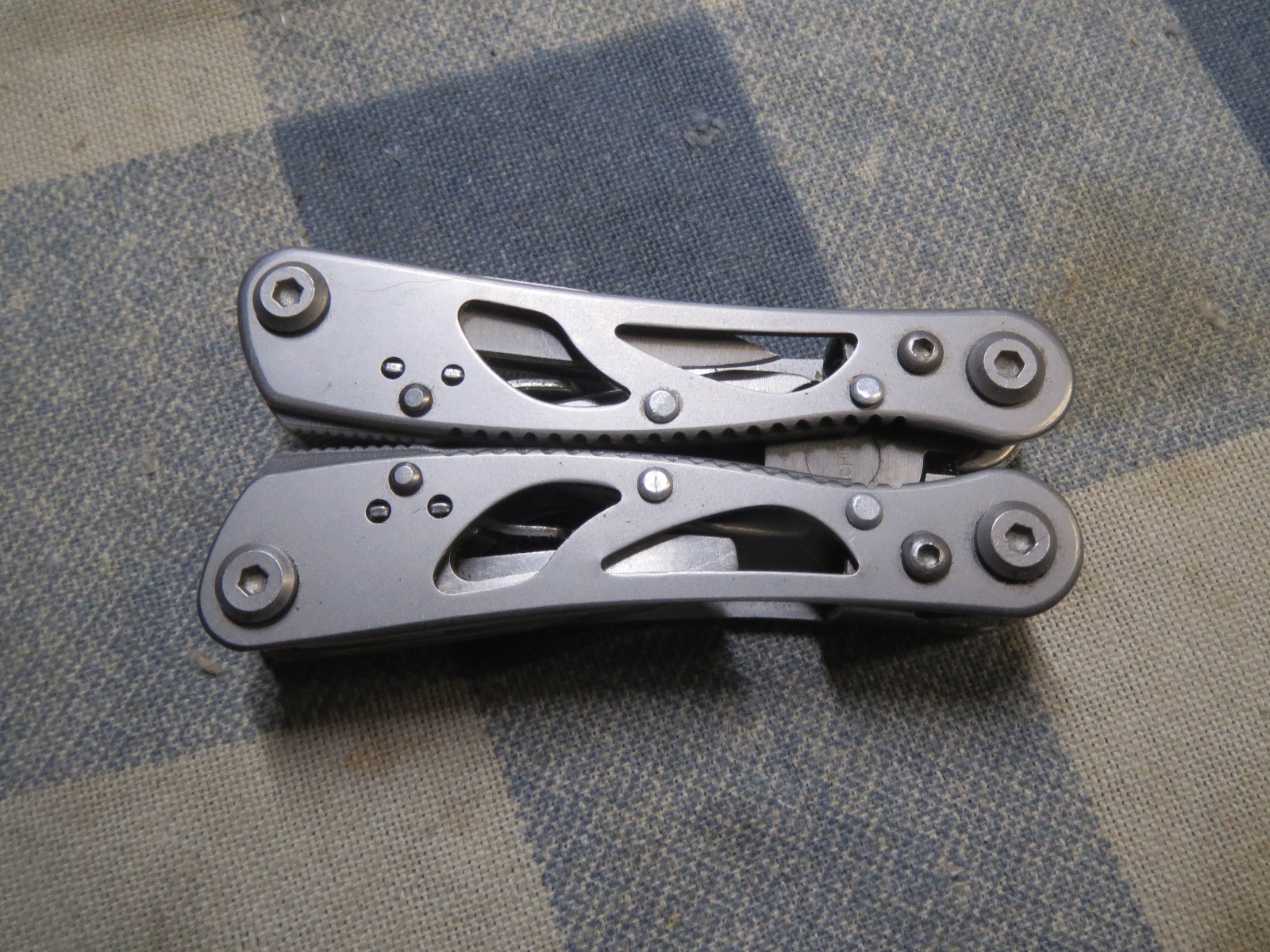 Used Small Stainless Multi-Tool 2 13/16 inch folded length