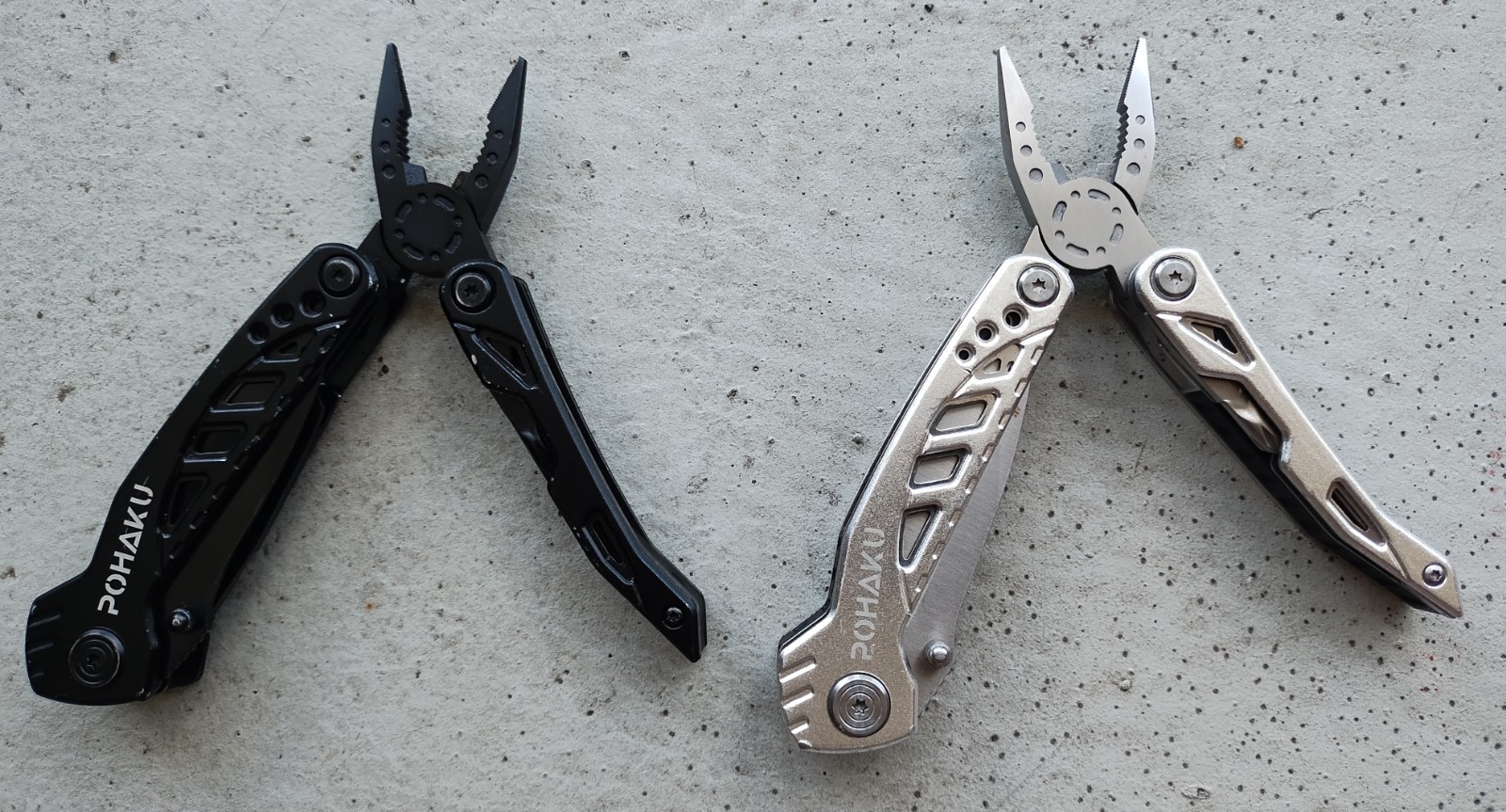 POHAKU BLACK & SILVER MULTI TOOL PLIERS KNIFE, SAW BLADE, FILE, ETC. LOT OF 2