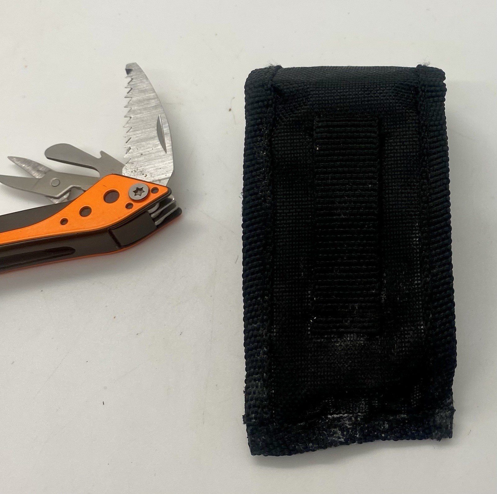 Cabela’s Multi-Tool 7 Tools in 1 Orange Knife Pliers Stainless Steel Black Case