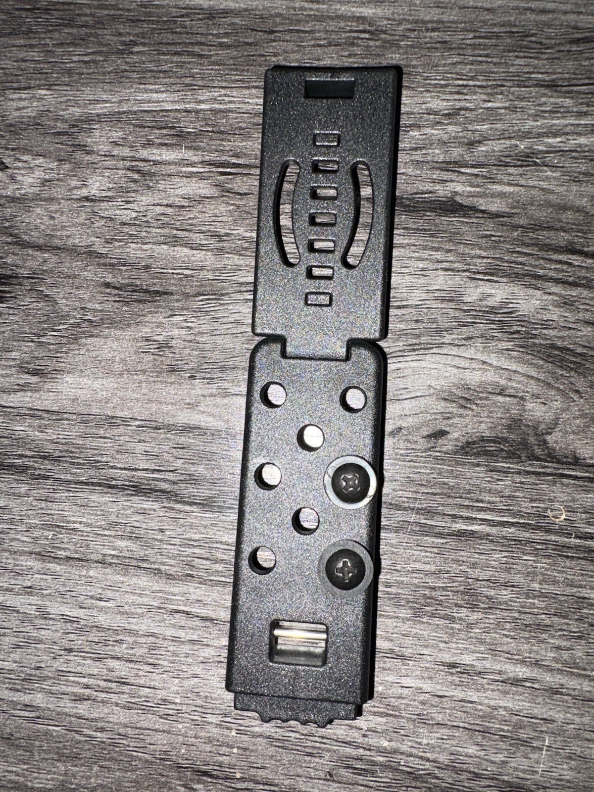 Fixed blade adjustable belt clip. Horizontal or vertical.