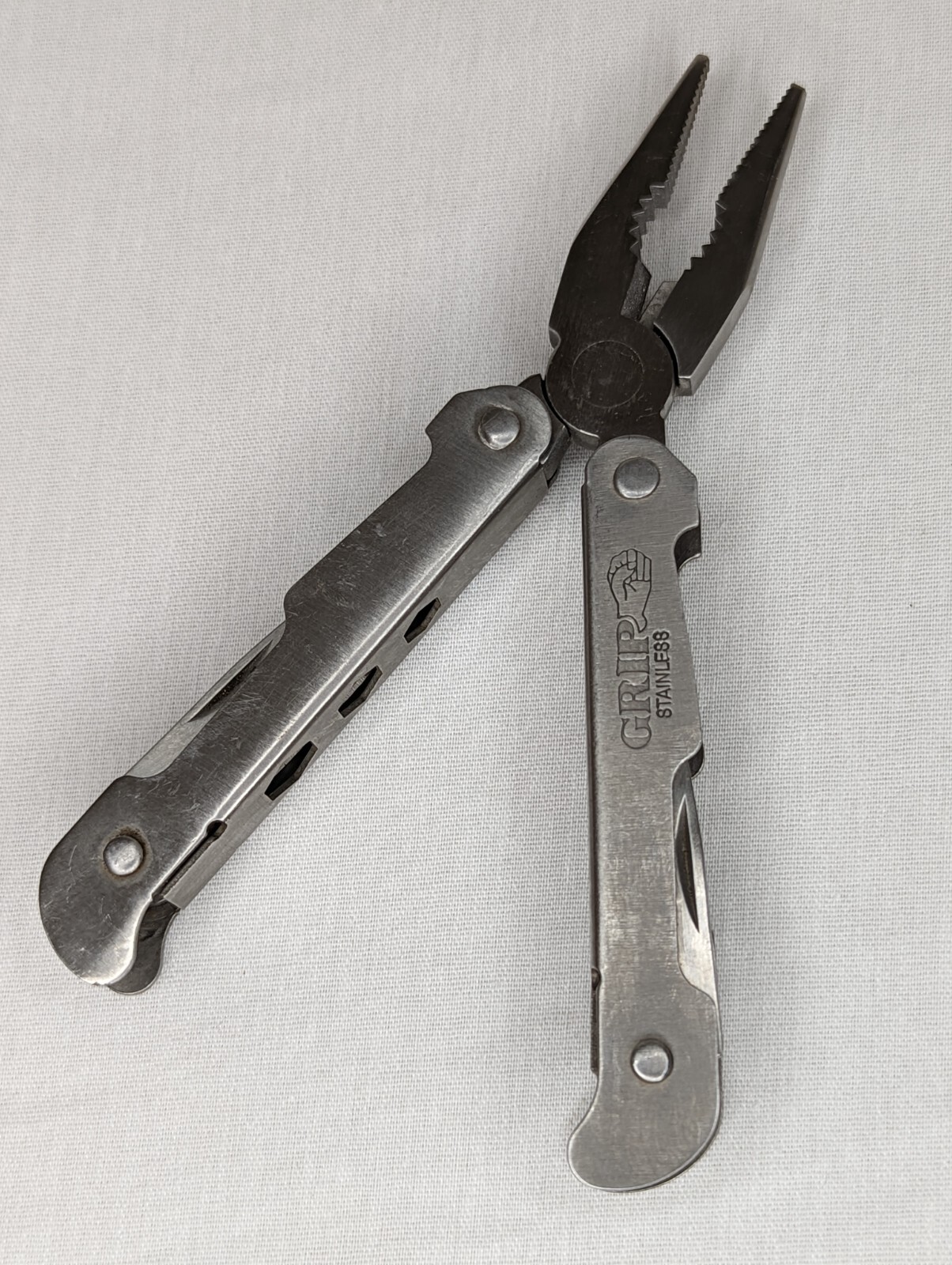 Grip Stainless Multi Tool Pliers, Knife, Bottle Opener, Philips Screwdriver