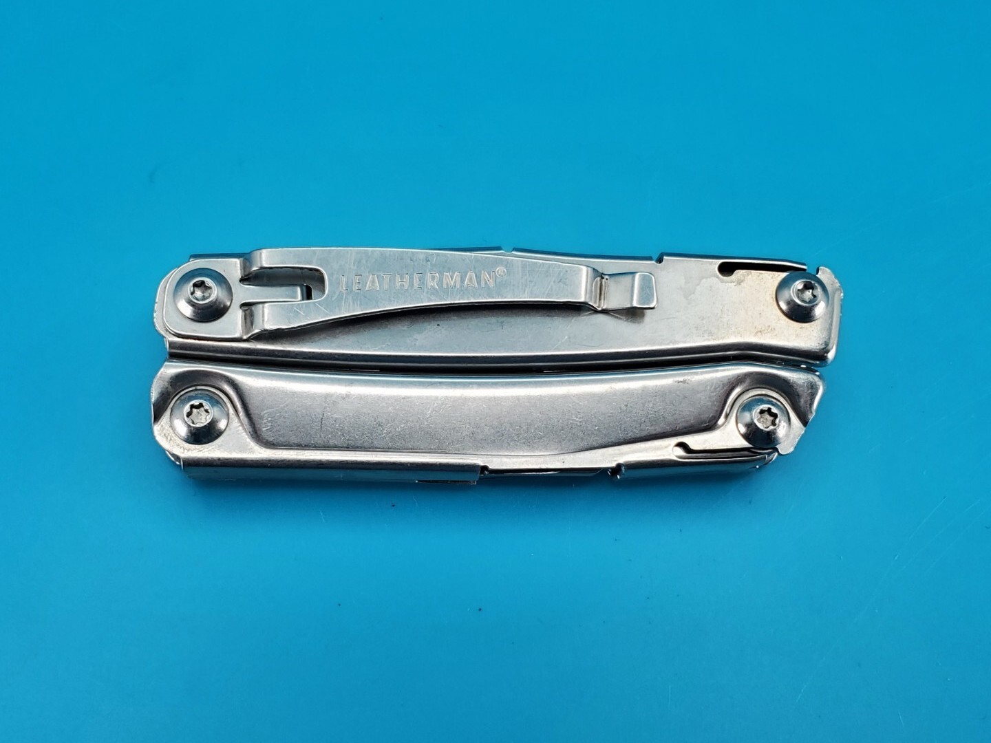 Leatherman Rev 3.8″ Multi-Tool, Stainless! *SOME RUST ON ITEM*