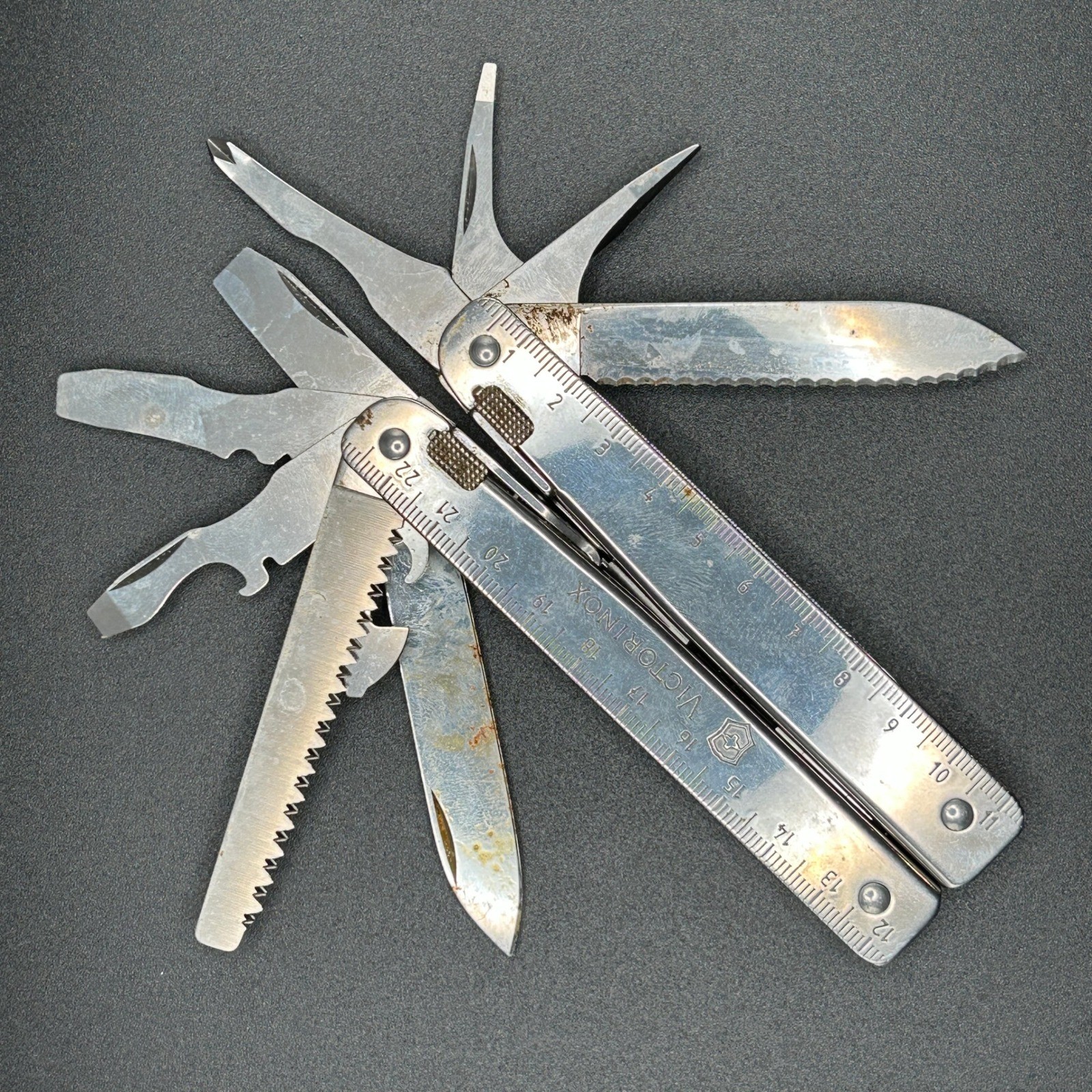 VTG Victorinox SwissTool Multi-Tool Stainless Steel W/Black Pouch Swiss Made