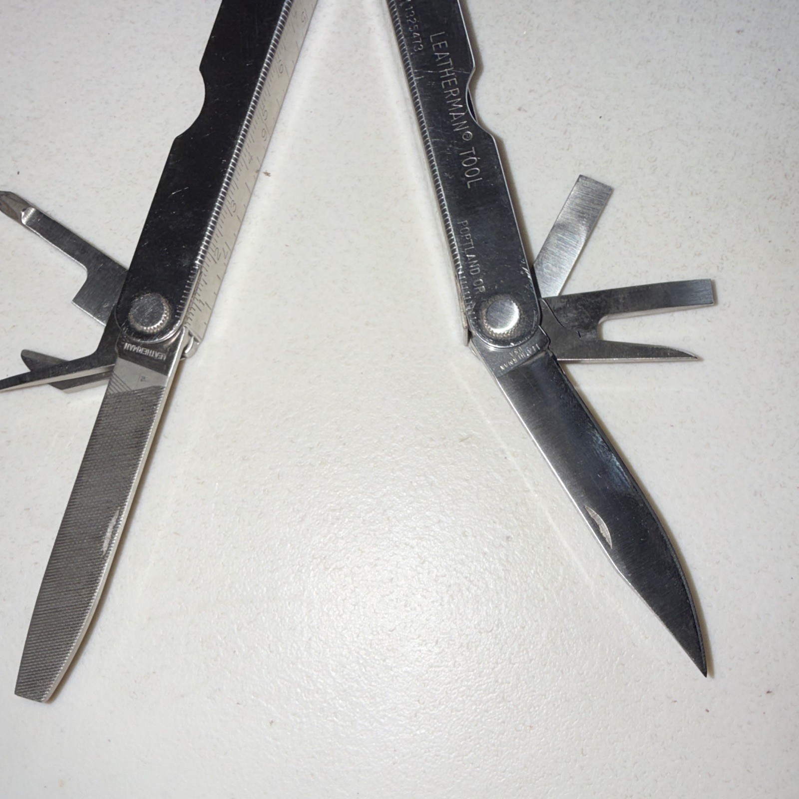 Leatherman Pocket Survival Tool Multi-Tool Pliers Knife File w/ Leather Sheath