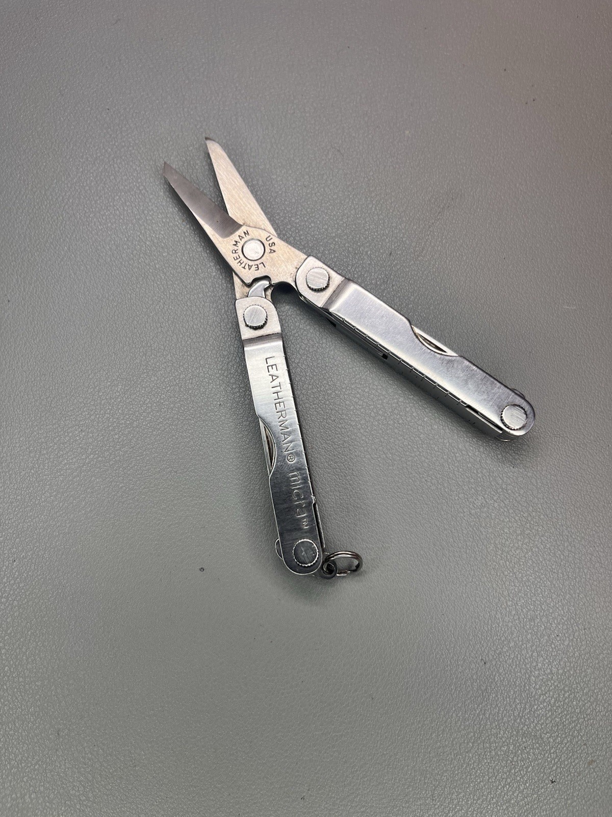 Leatherman Micra keychain multi-tool with sheath. USA