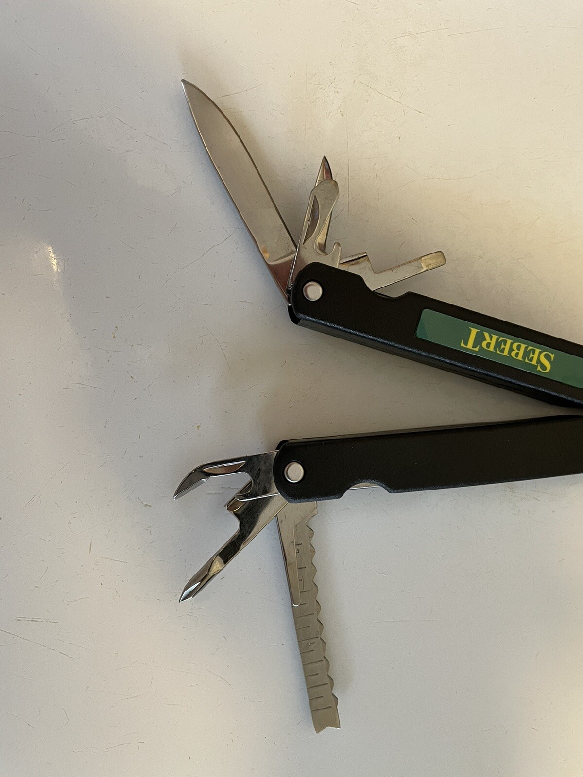 Barlow multi tool. New In Box With Pouch. Sebert Landscaping Logo.