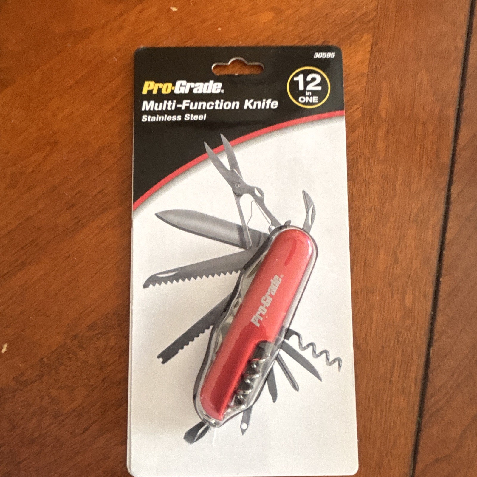 Pro-Grade 12-in-1 Stainless Multi-Tool Red Scissors Saw Bottle Opener 30606