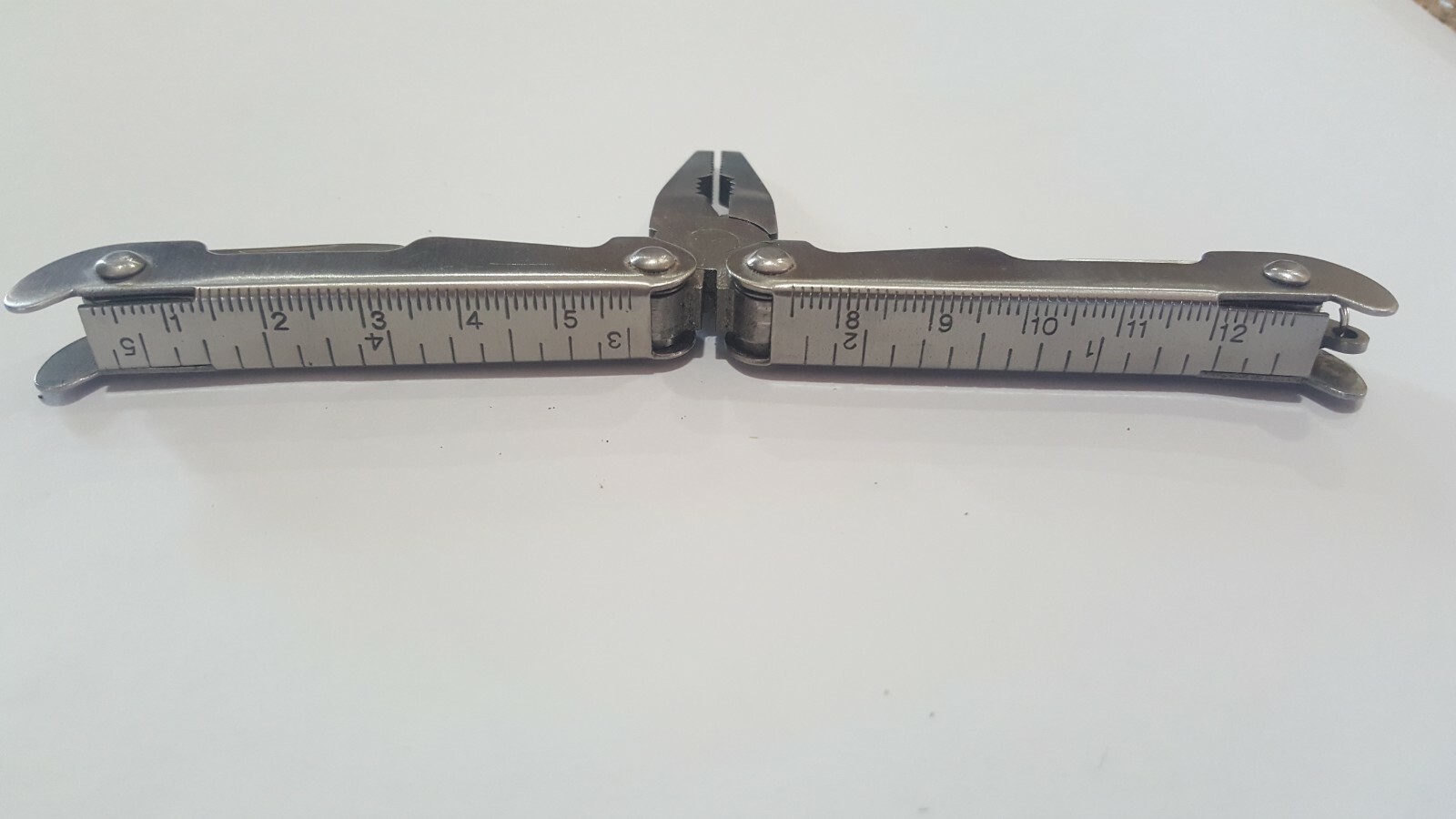 NEW SMARTGEAR 10-FUNCTION HAMMER MULTI-TOOL PLUS USED WINCHESTER MULTITOOL