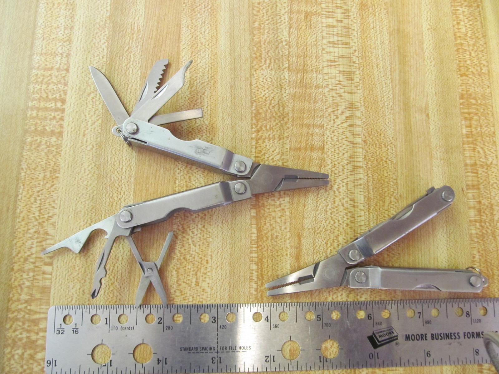 Lot of 8 Various brands inc. Winchester and Coast Multi Tools