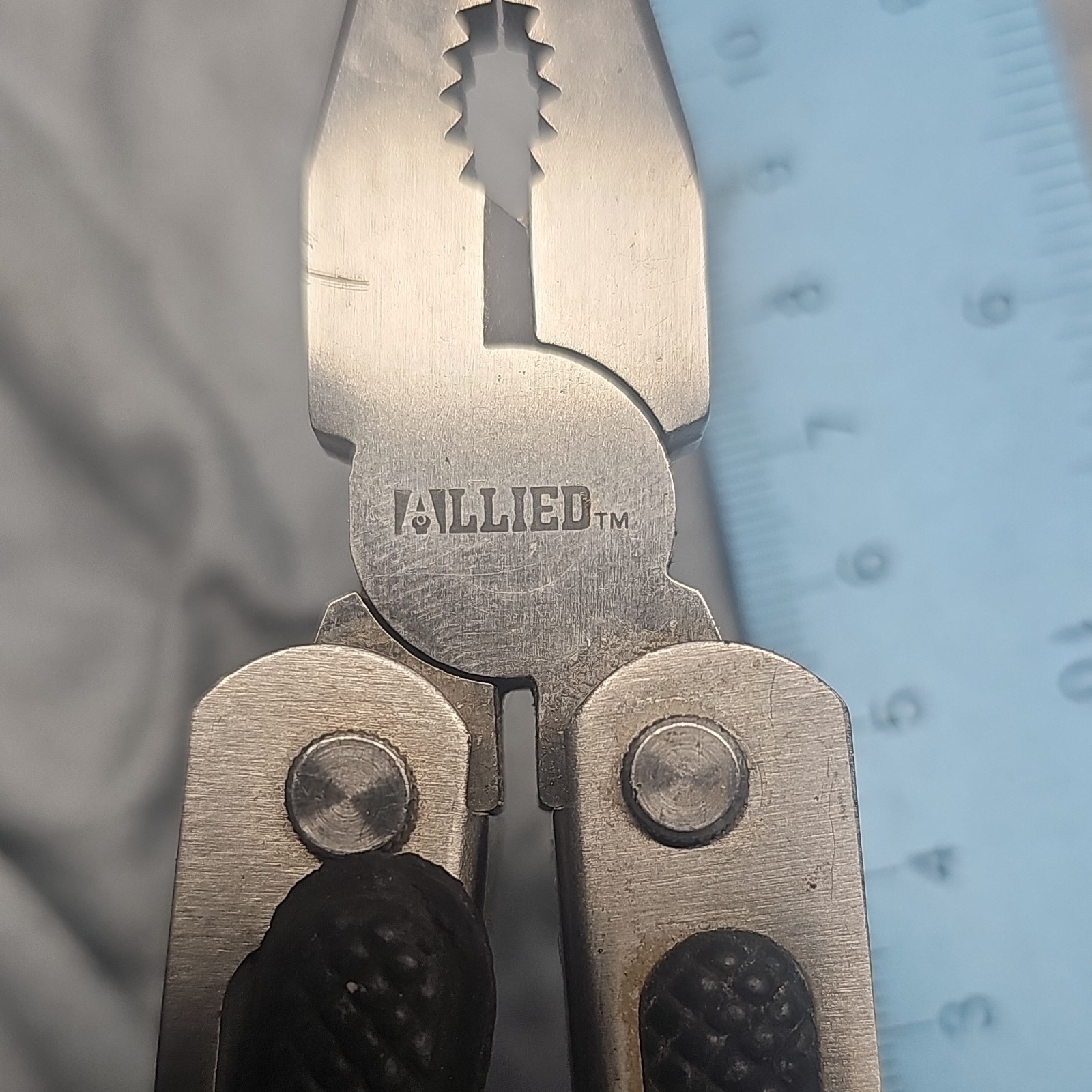 ALLIED Stainless Steel Multi-Tool Pliers 7 Tools: Knife, Saw, Ruler Silver/Black