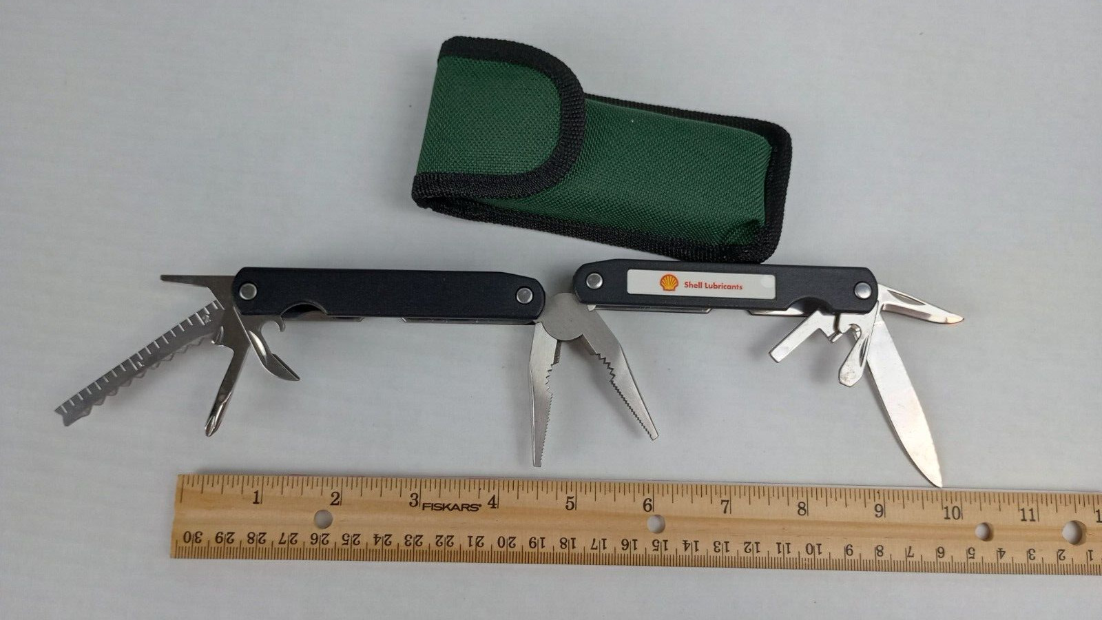 Multi Tool Camping Hunting Green Canvas Case Shell Lubricants Logo
