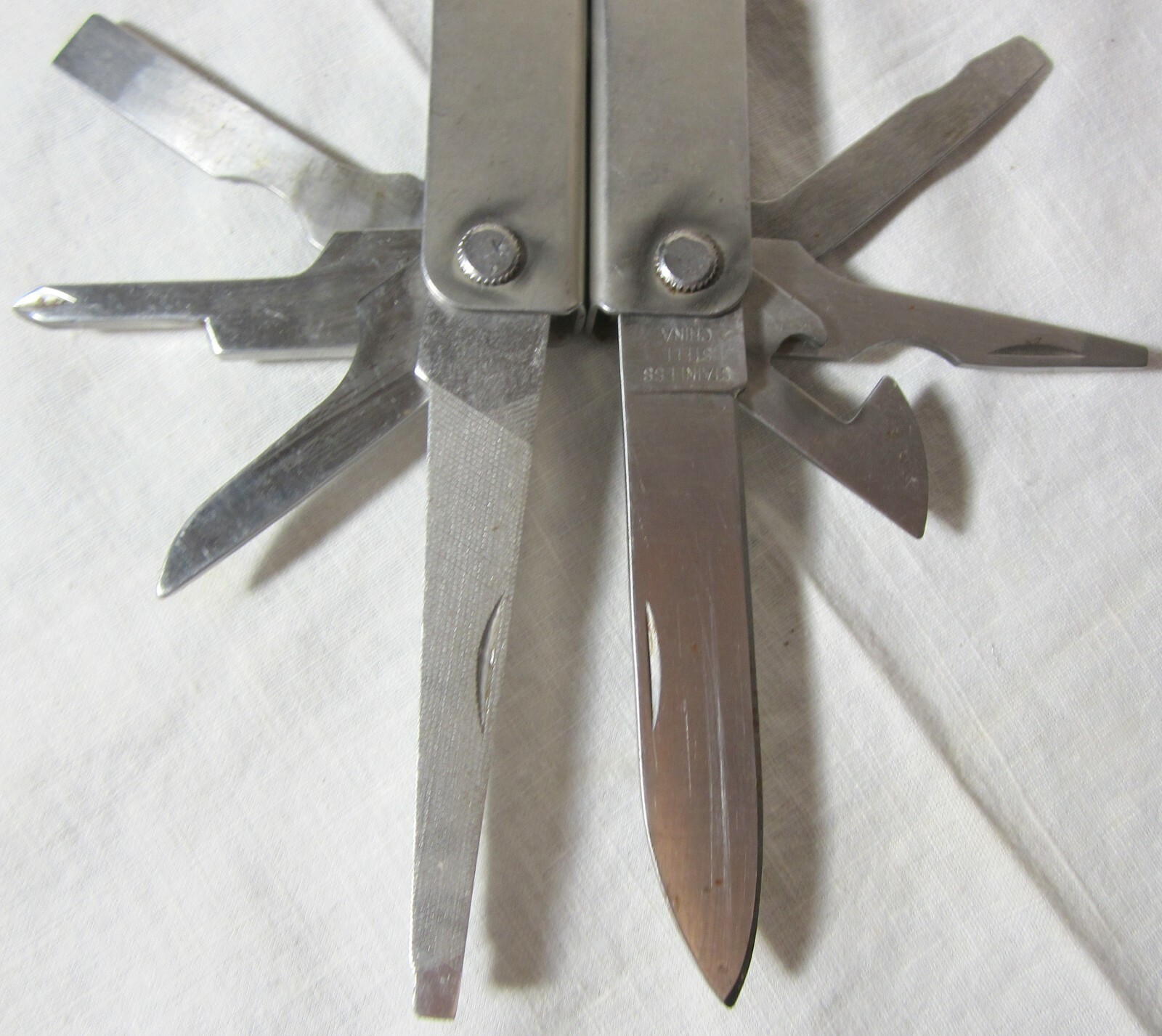 Kangli Multi-tool Pliers Knife Screwdriver Nail File Scissors Awl Saw Stainless