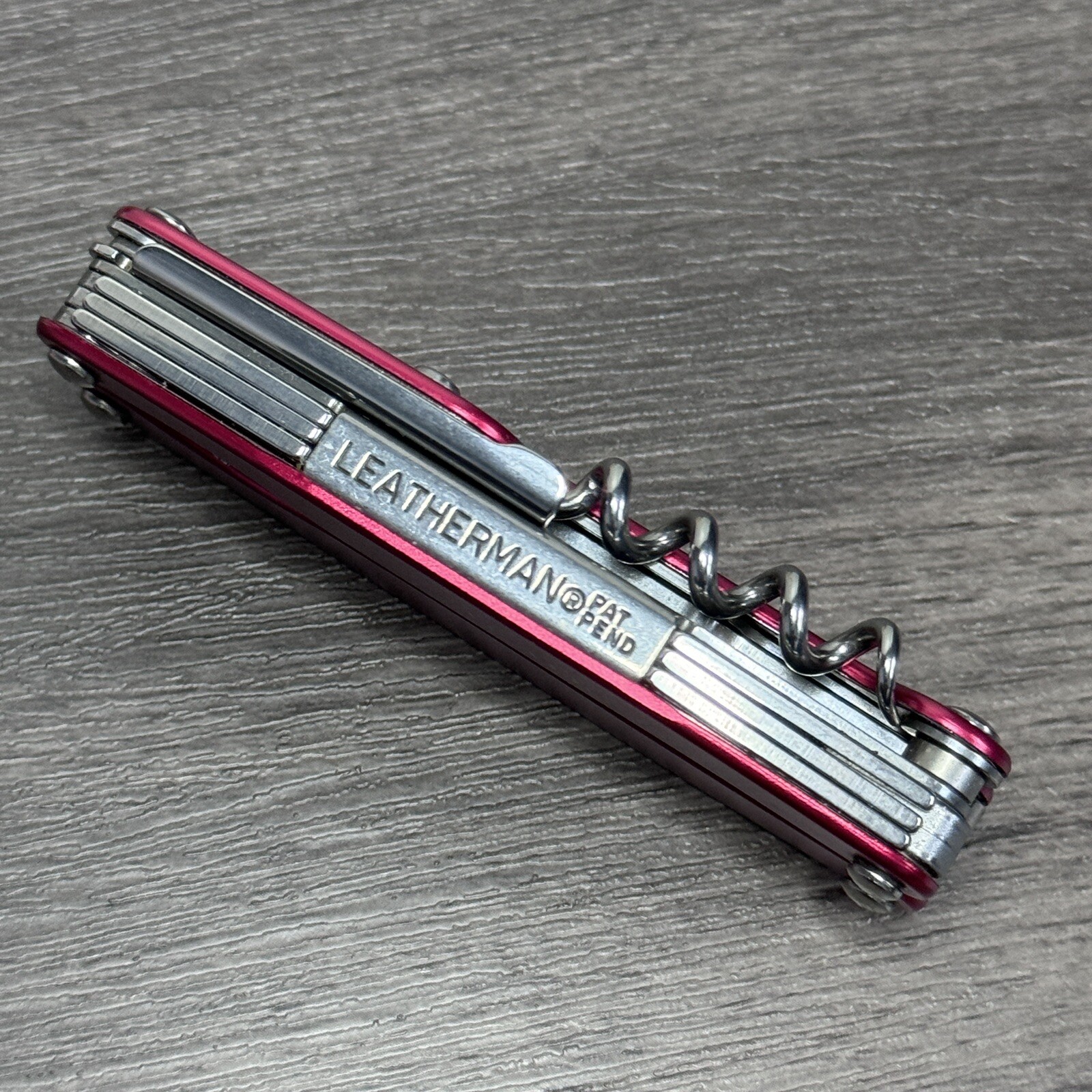 TWO Leatherman Juice C2 Red multitools. TM variants. Discontinued